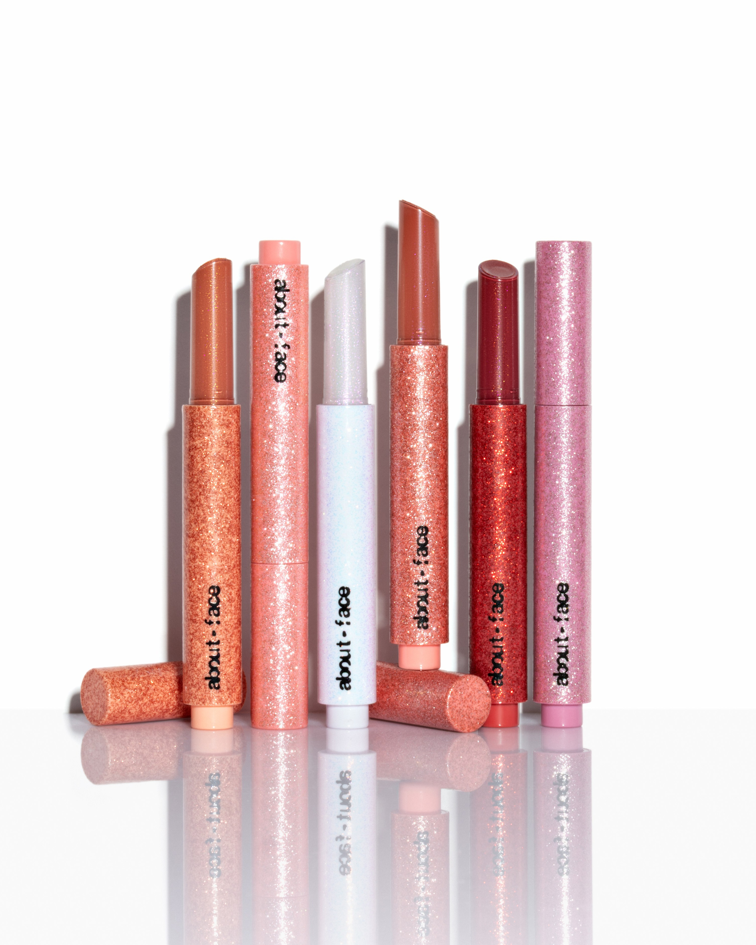 About Face shimmer sticks lipstick. Retouching, photo editing, portfolio retoucher