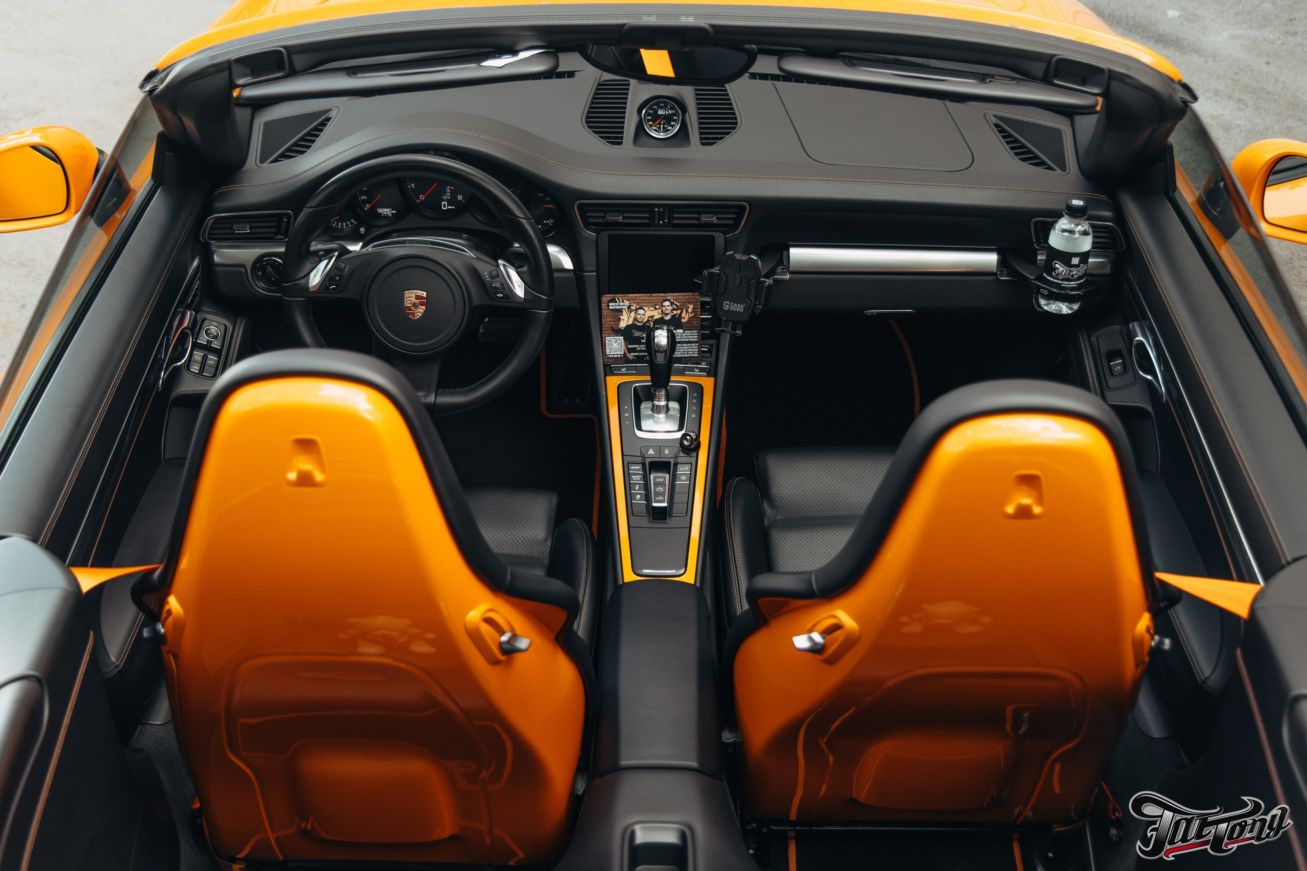 Porsche 911 оранжевый замена ремней безопасности. DeLorein