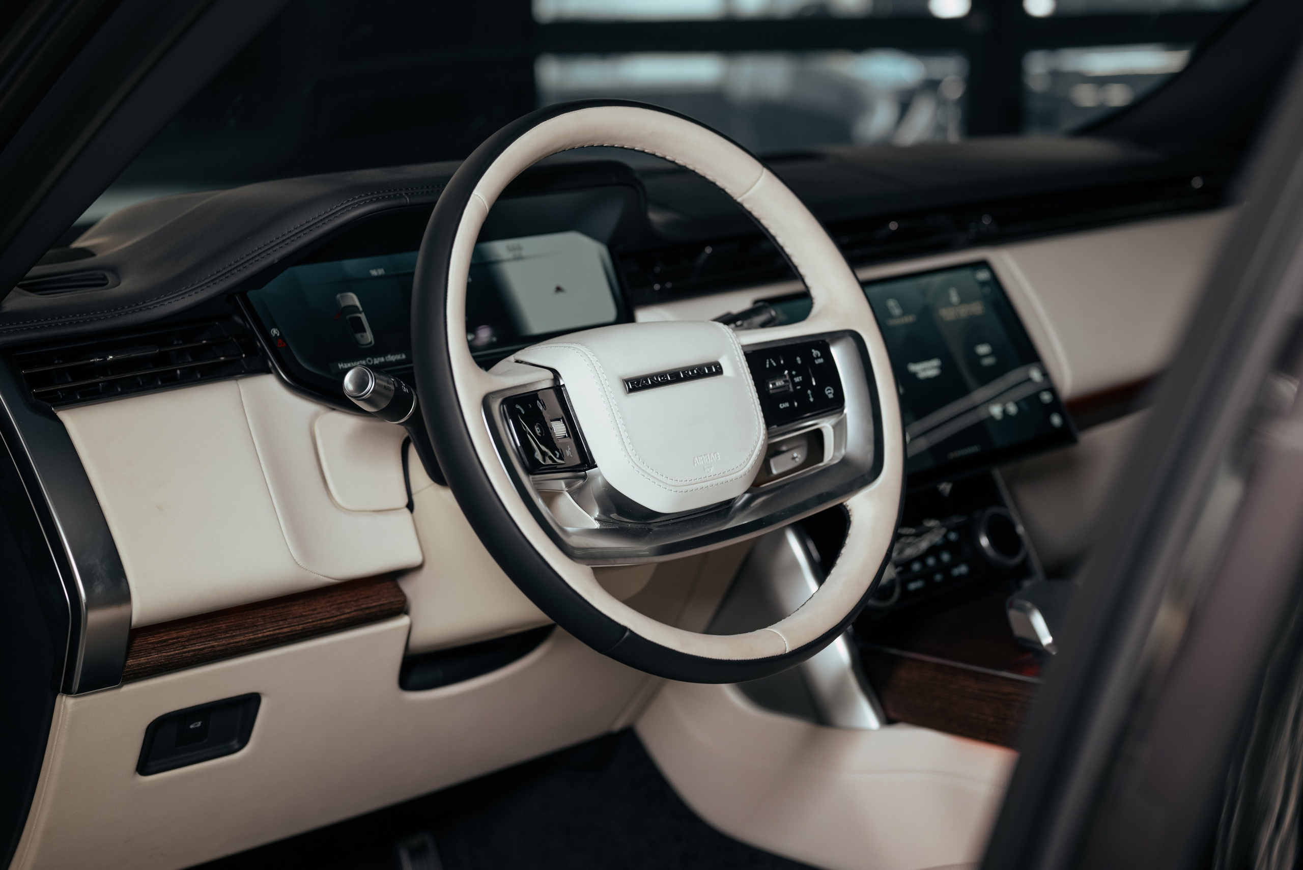 Range Rover long brown on white. DeLorein