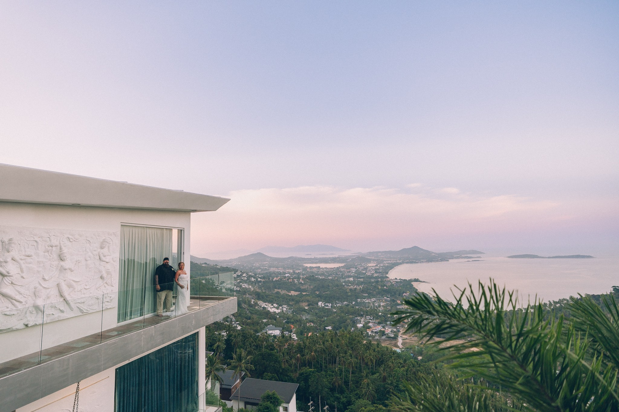 Bride and groom celebrating a sunset wedding at a villa in Koh Samui