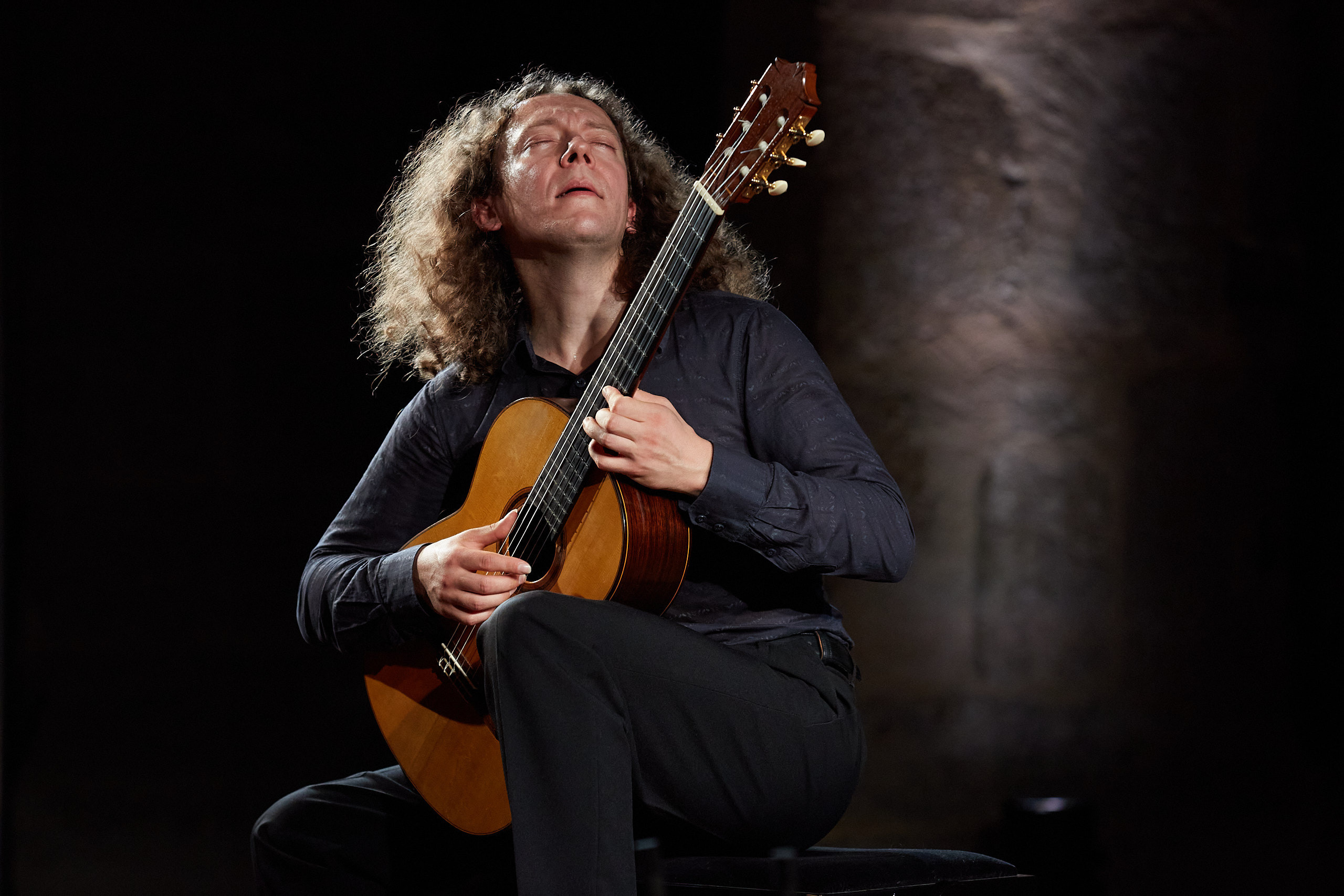Russian classical guitarist Dimitri Illarionov during performance.