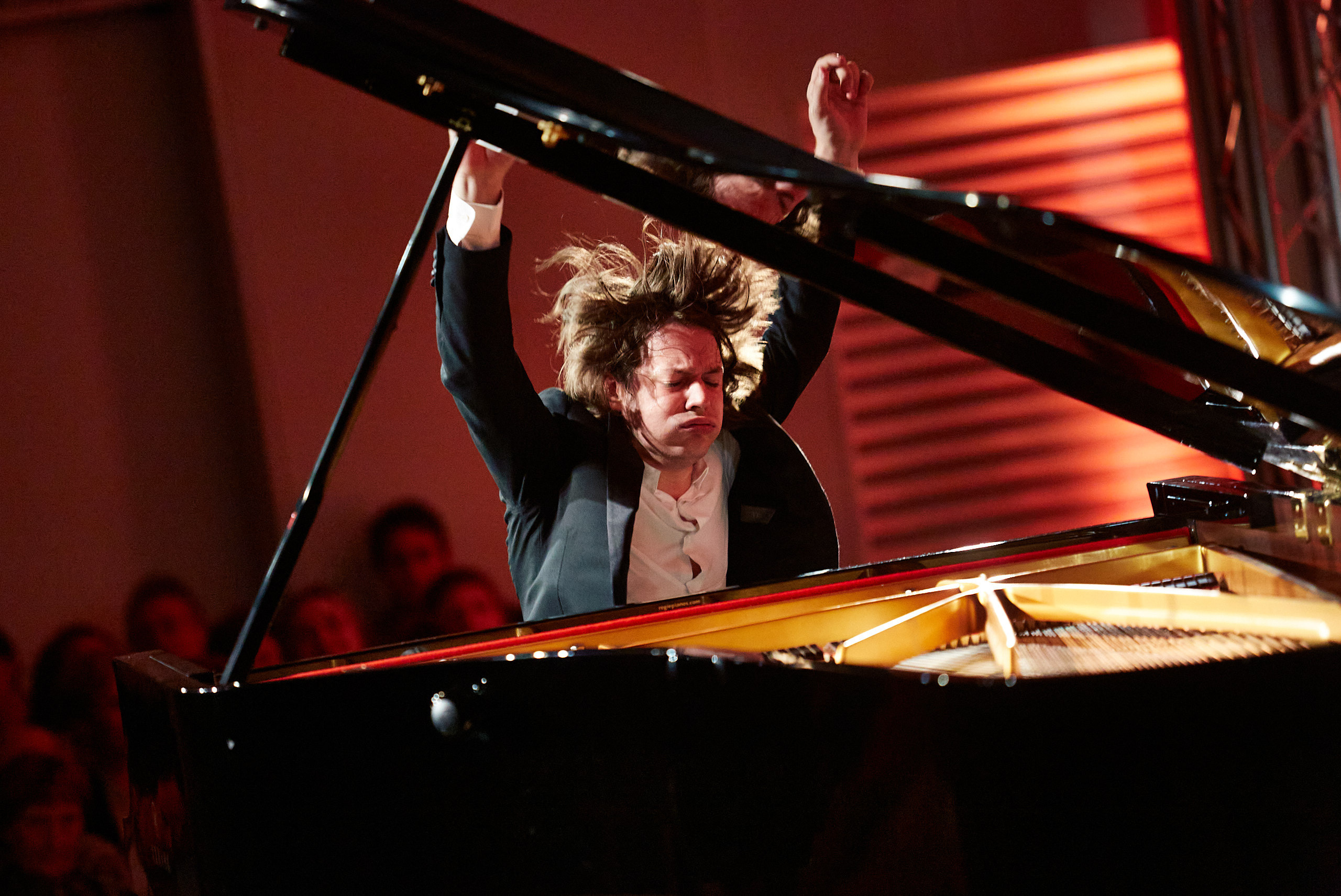 David Fray French pianist impressive photo on the stage.