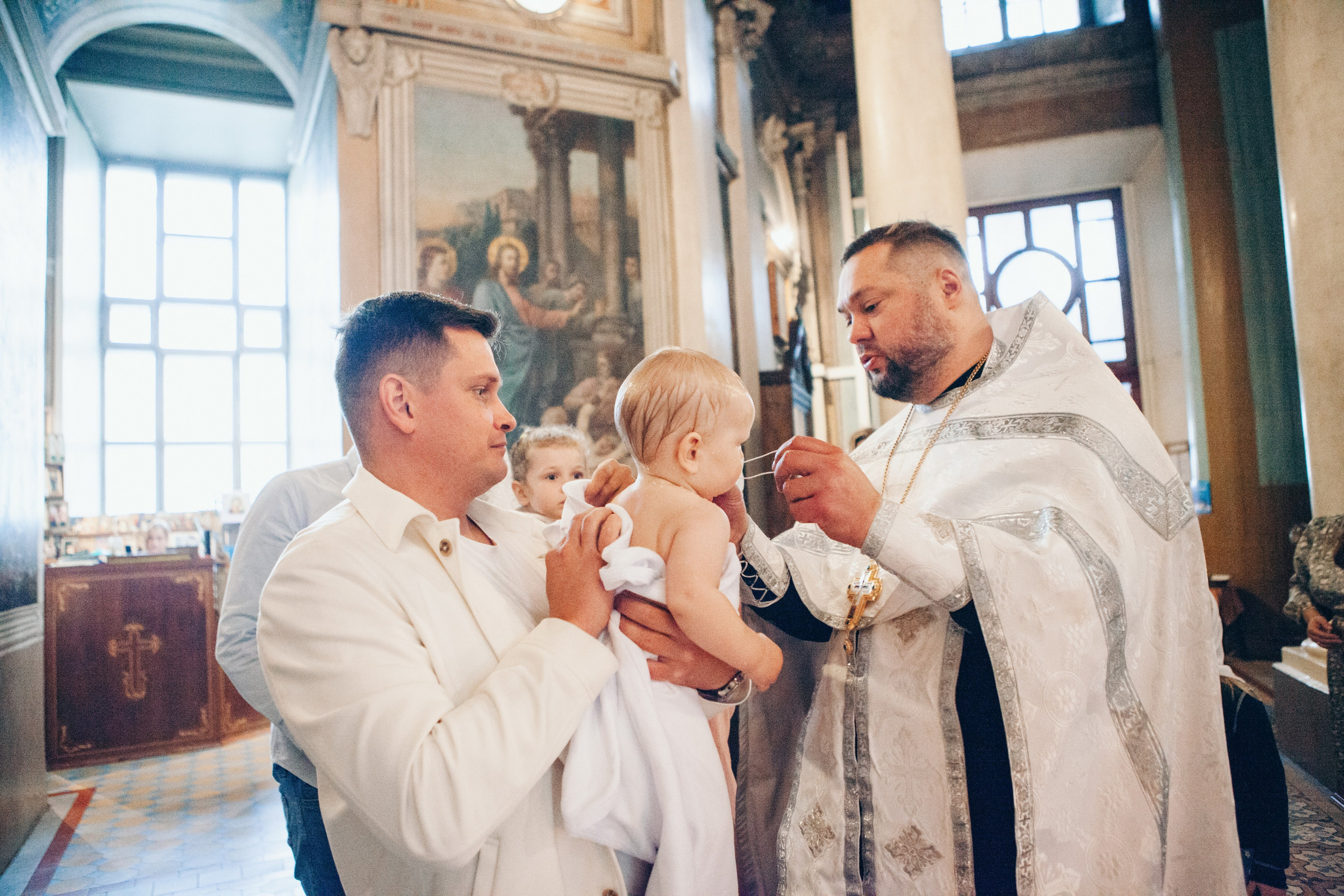Крещение ребенка в церкви. Фотограф Ольга Ефремова