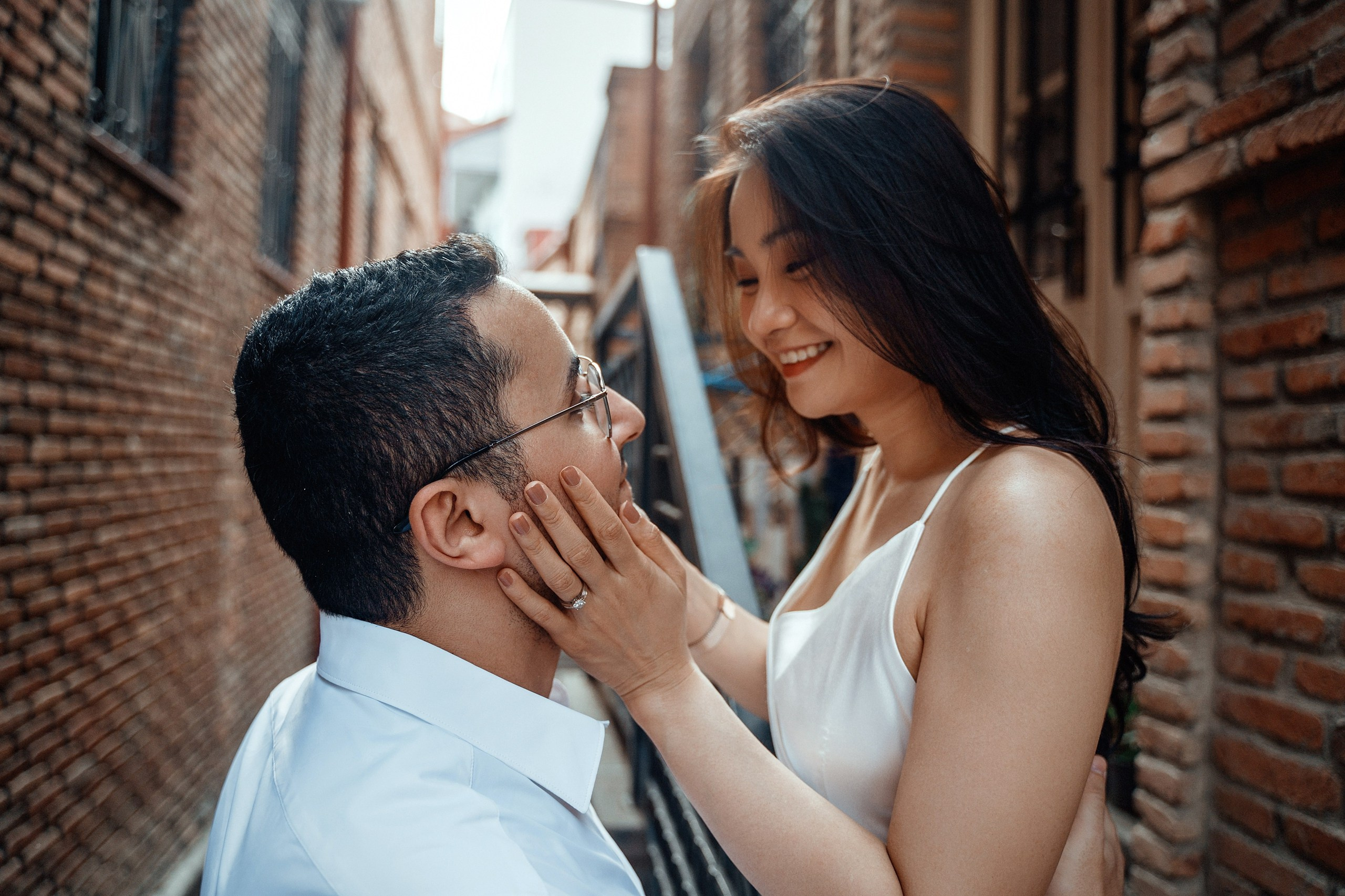 Alaeddine & Matika on the Peace Bridge in Tbilisi. Photographer Sergey Otkrytyi in Batumi & Tbilisi
