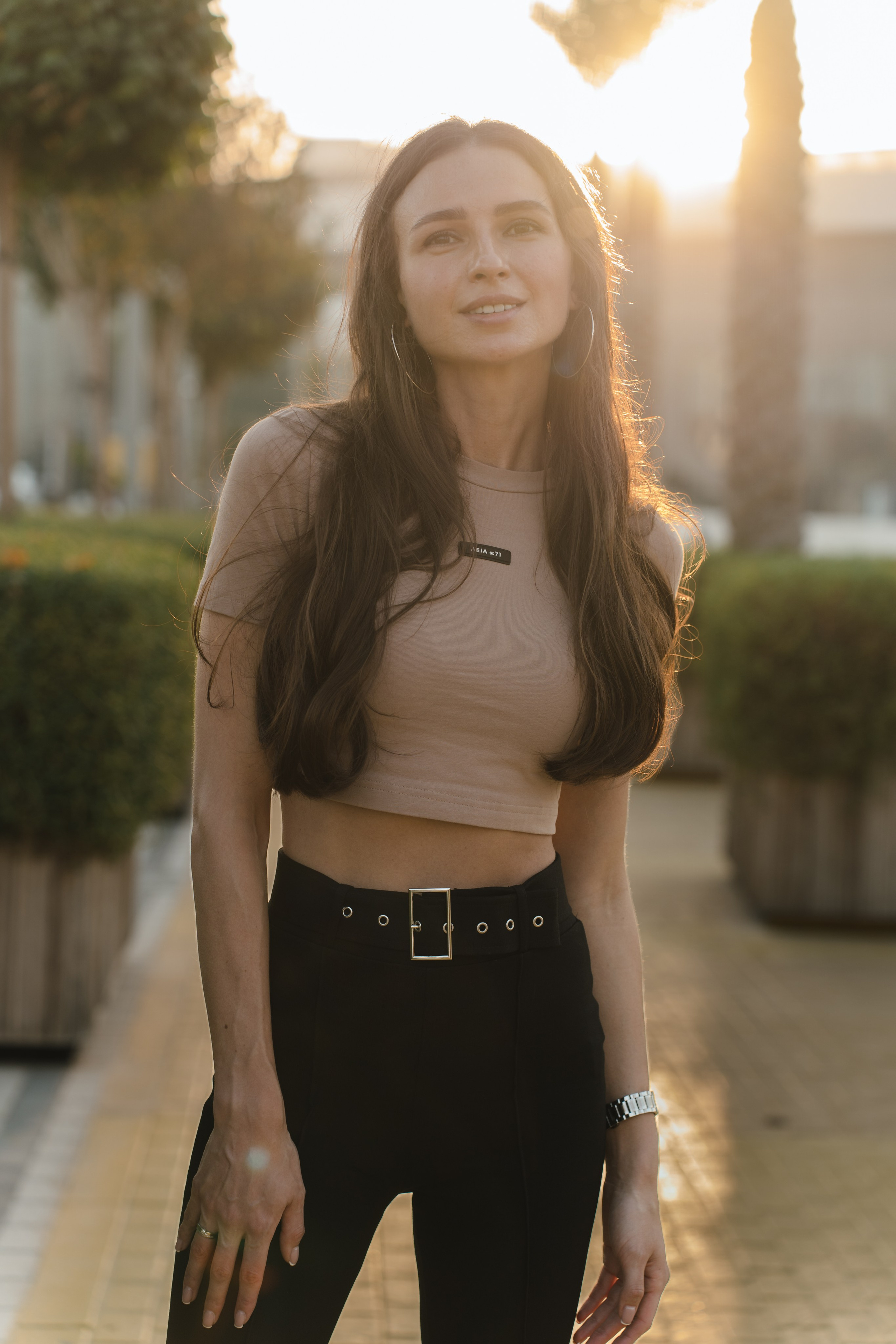 Woman in flowing dress walking through Expo City