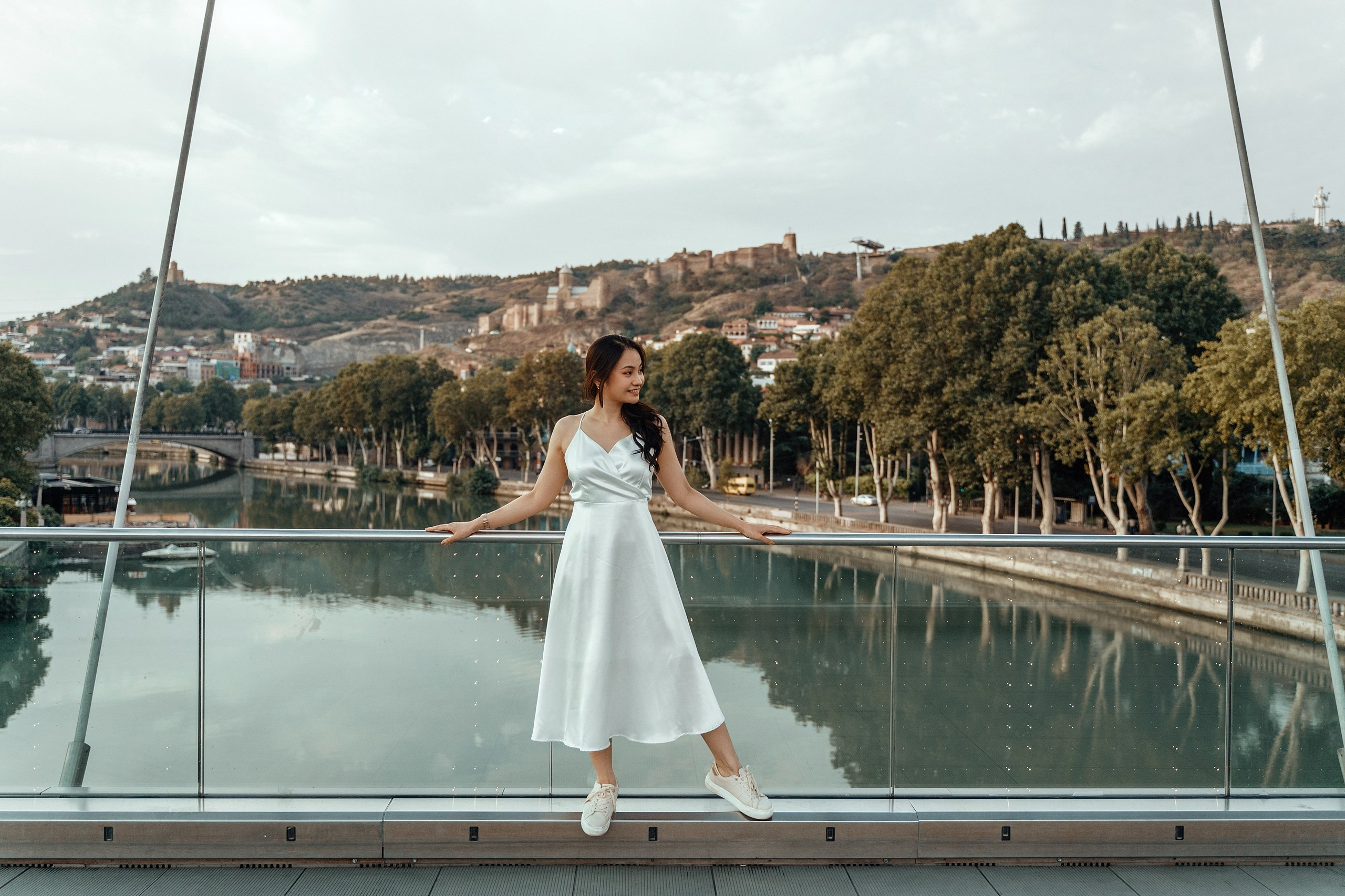 Alaeddine & Matika on the Peace Bridge in Tbilisi. Photographer Sergey Otkrytyi in Batumi & Tbilisi