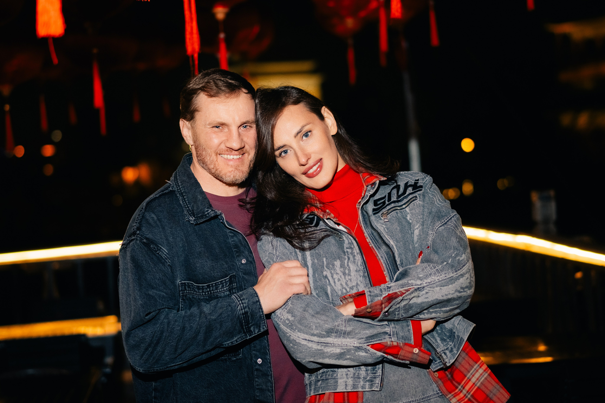 Couple hugging during a romantic photo session in Shanghai, warm evening.