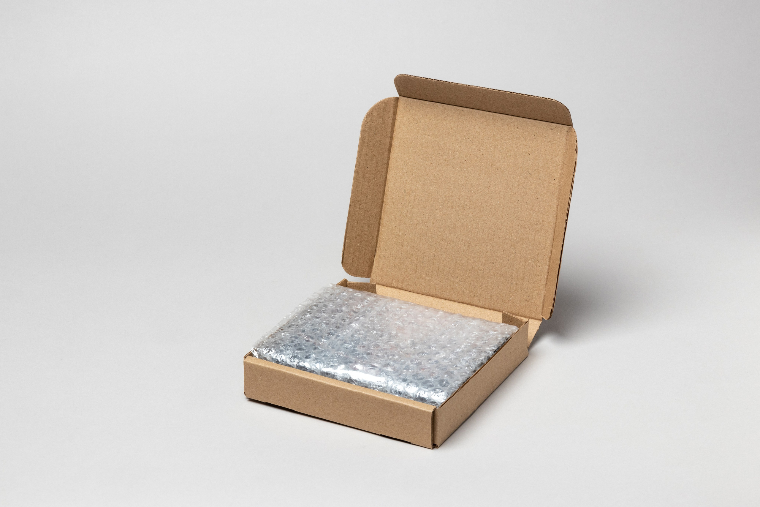 Съёмка упаковки на сером фоне. Предметный фотограф в Нижнем Новгороде Денис Павлов