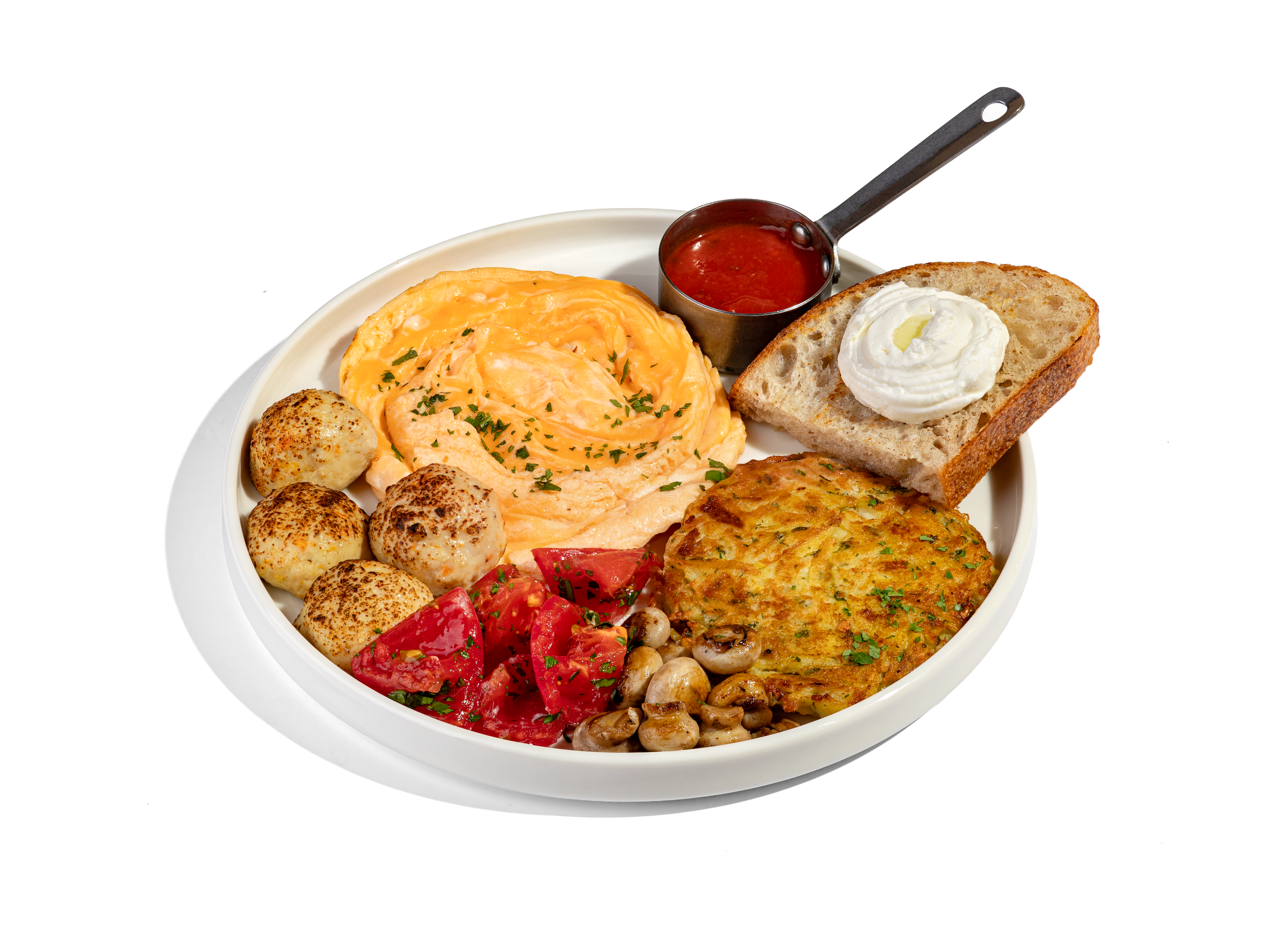 БОЛЬШОЙ ЗАВТРАК С КУРИНЫМИ ФРИКАДЕЛЬКАМИ — 990₽. Куриные фрикадельки, картофельный дранник, омлет - торнадо, грибы шампиньоны, томаты, взбитый сыр фета.