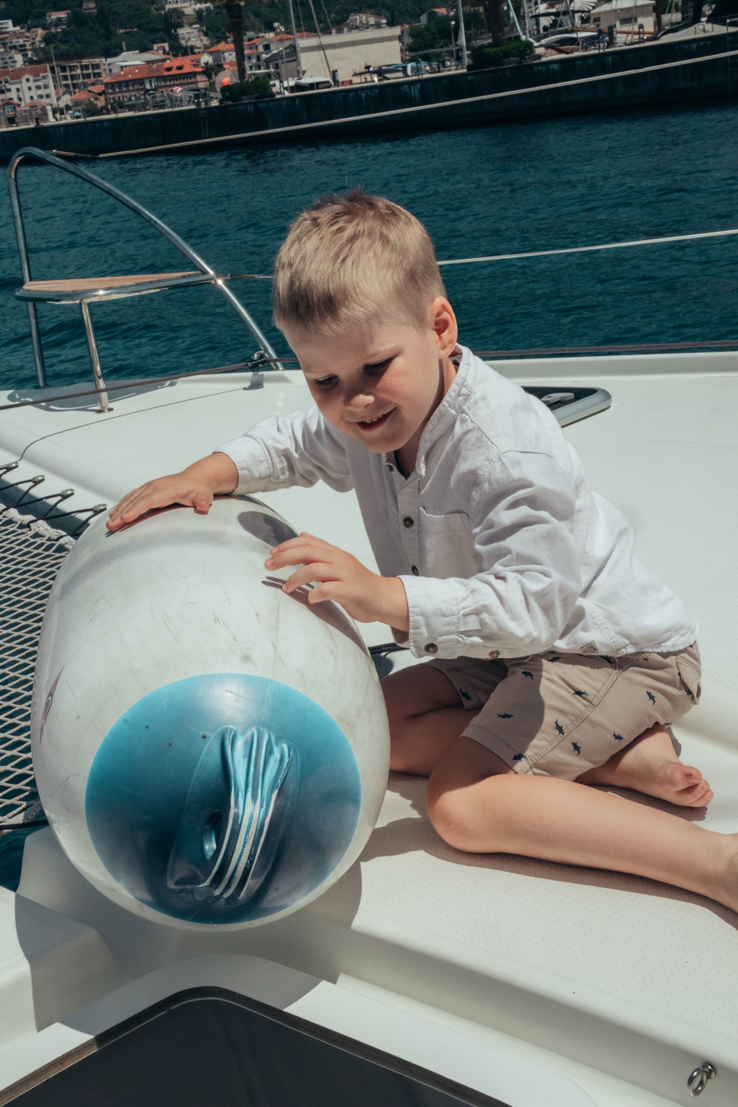 Boat tour with Anna, Roman and Tim. Portrait photographer in Tivat Montenegro Katerina Kirsanova