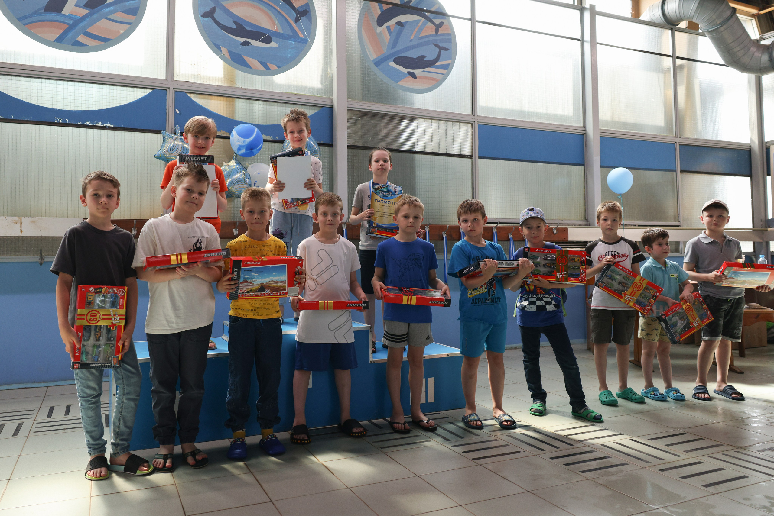 Веселый дельфин. Плавание. Дети 8-9 лет. Фотограф Александр Заломаев