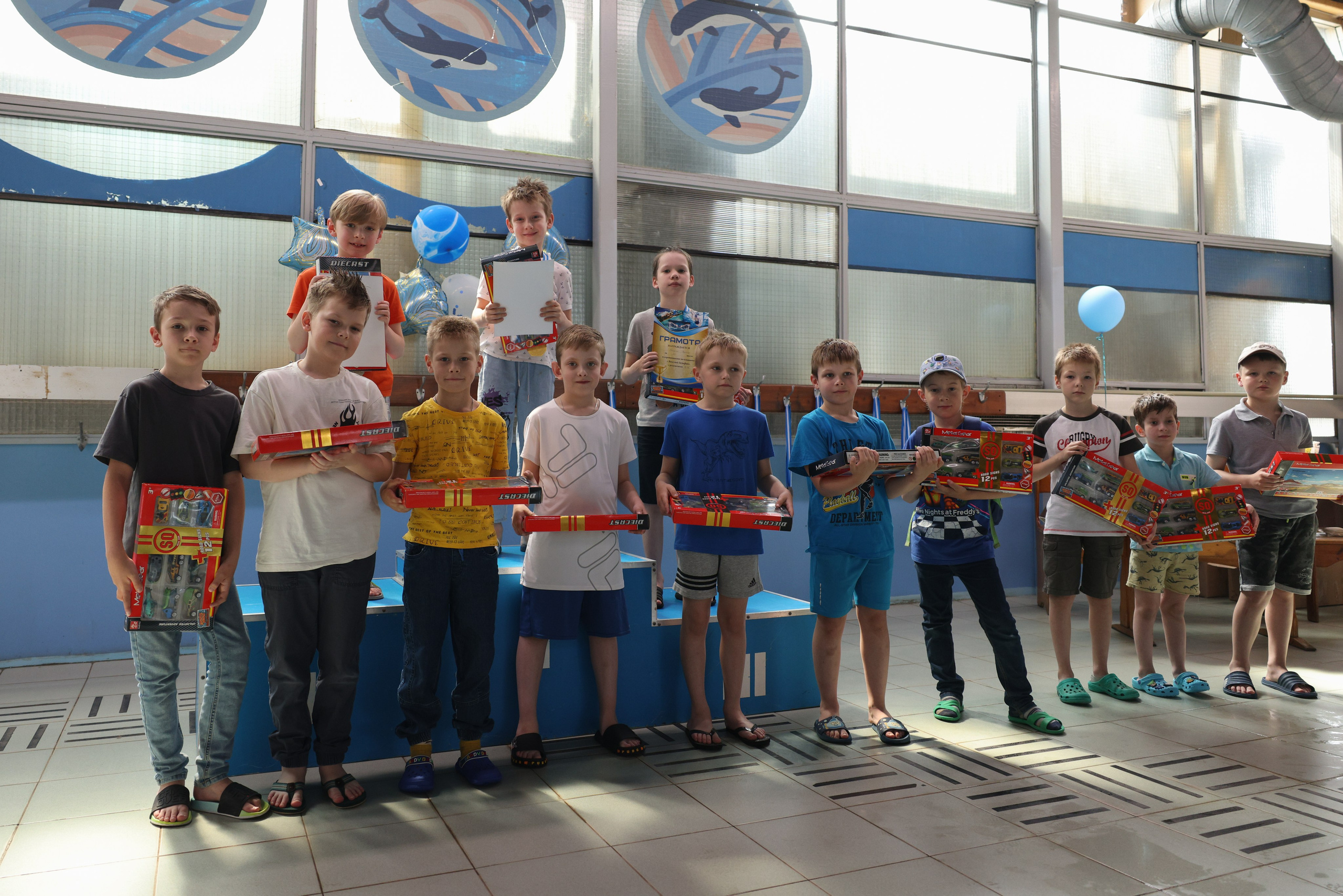 Веселый дельфин. Плавание. Дети 8-9 лет. Фотограф Александр Заломаев