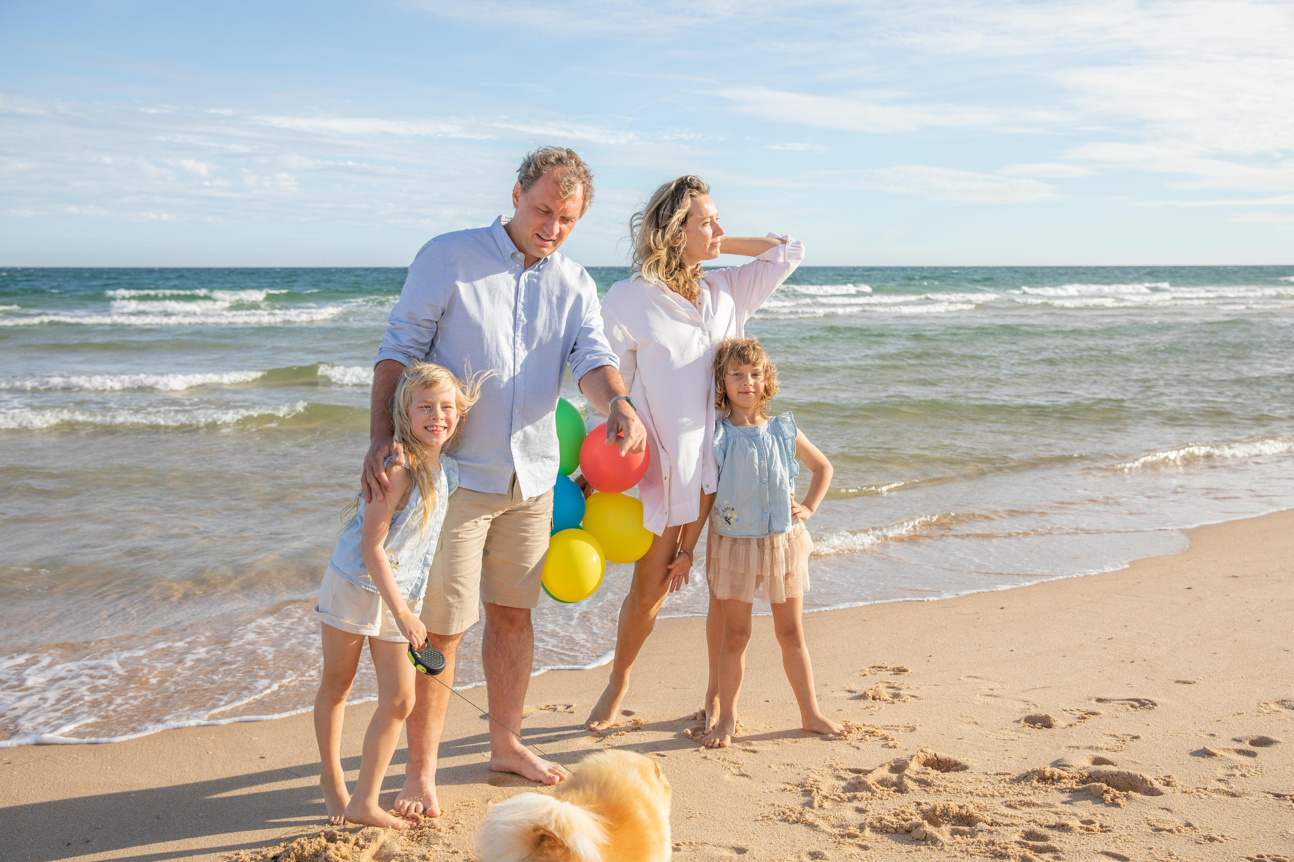 Family on the ocean. Professional Photographer in Portugal. Oksana Lomnova