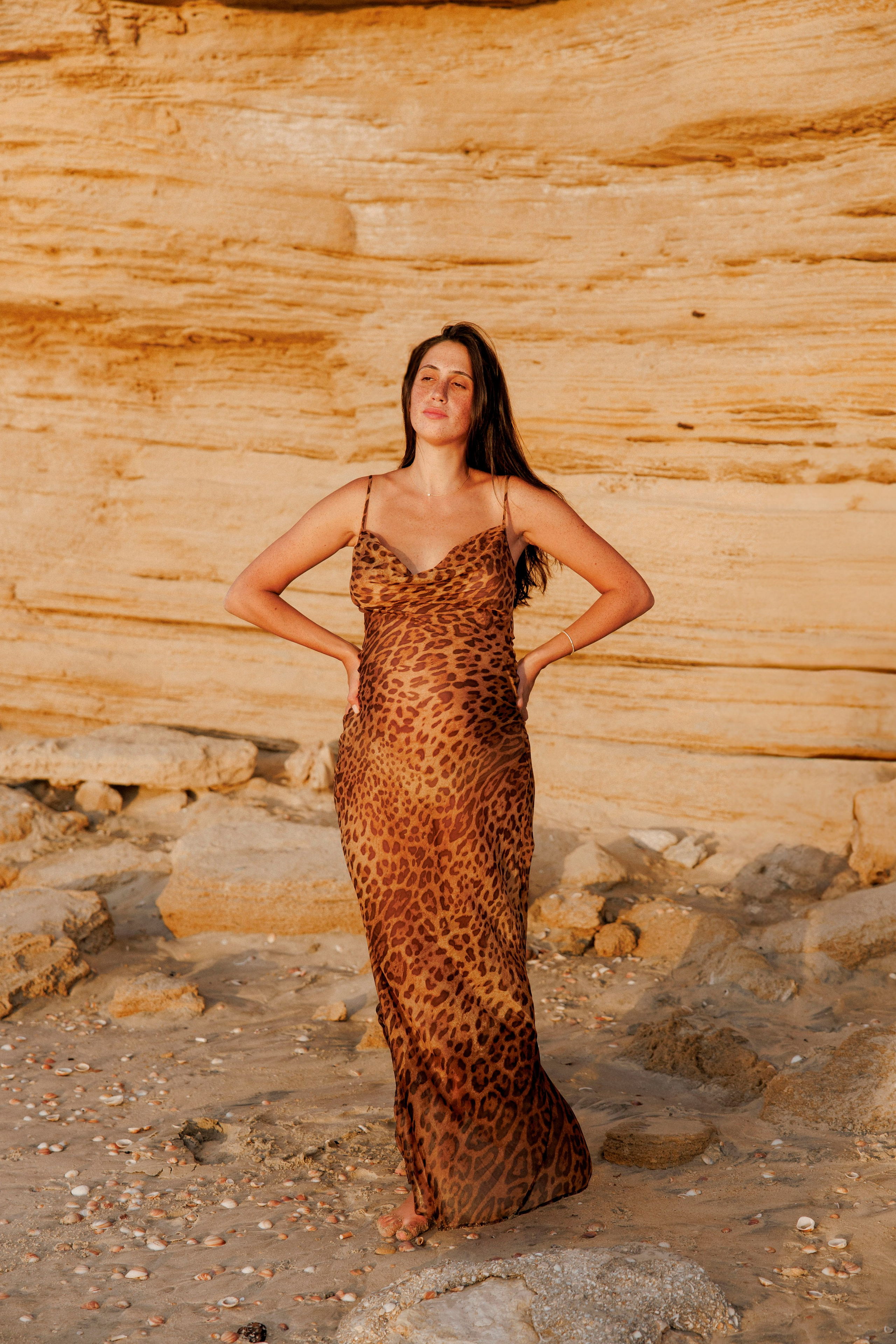 Pregnancy photoshoot near the sea. Wedding and family photographer