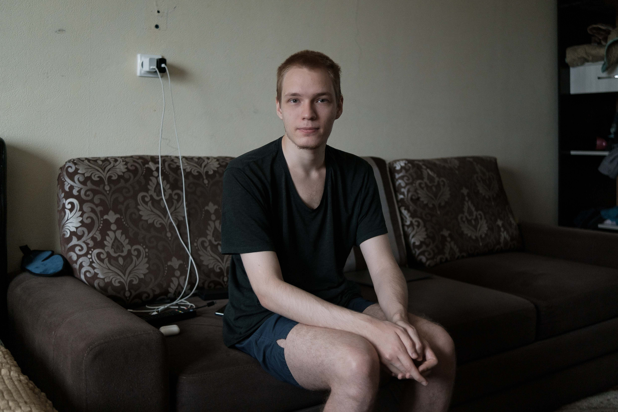 Oleg from Moscow in his rented apartment in Astana. Before the start of partial mobilization, Oleg worked in an IT company, took an active civic position, went to rallies and tried to monitor the political situation. Oleg spent the first week after the announcement of partial mobilization at work in correspondence with departing friends, and after that he himself decided to leave Russia. While Oleg was getting to Kazakhstan, he managed to rent a daily apartment, where he now lives with his friend. Oleg perceives the emergency departure from Russia as a temporary evacuation and hopes to return home when it is safe.