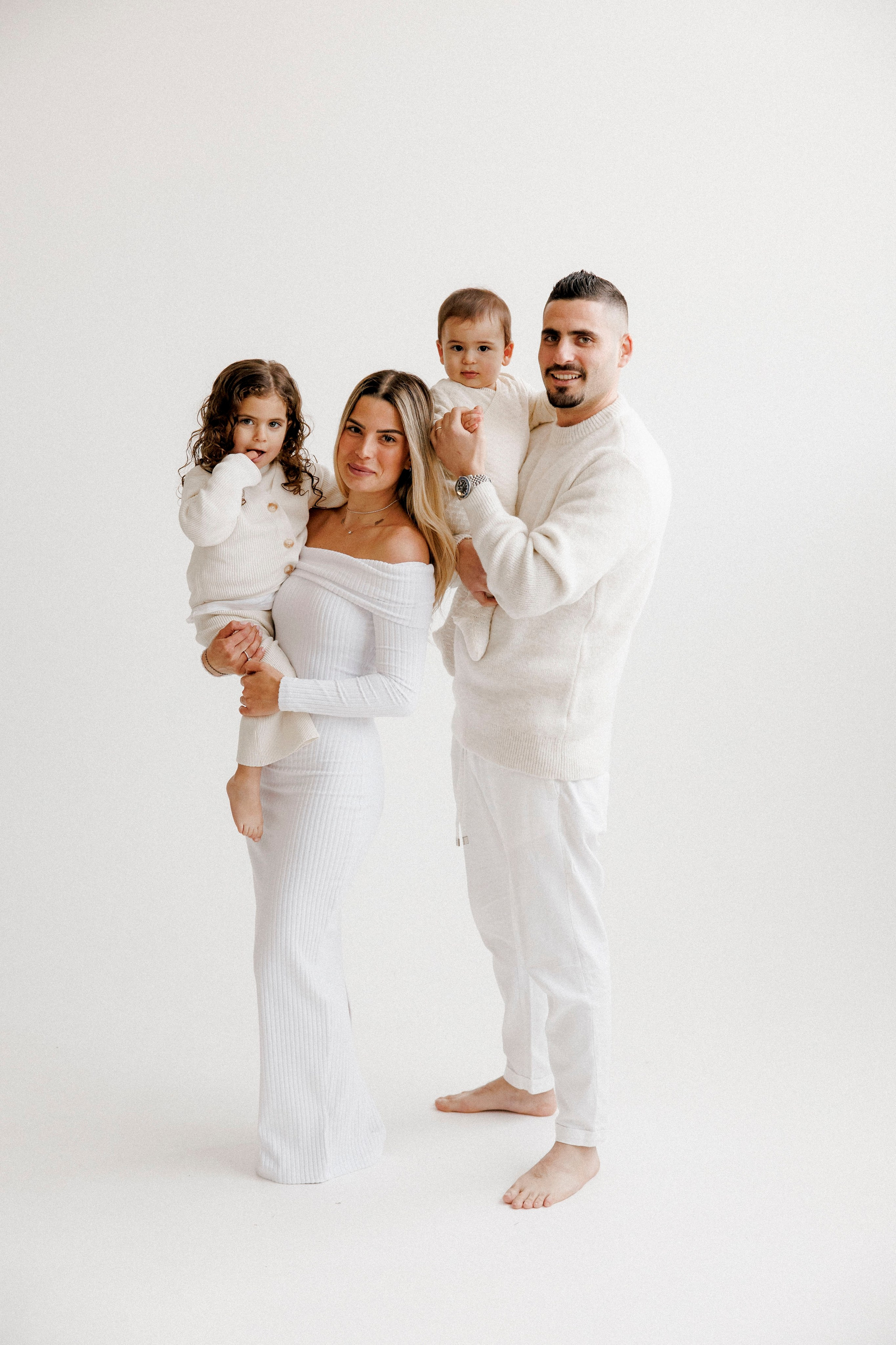 Family photoshoot in White Studio. Wedding and family photographer