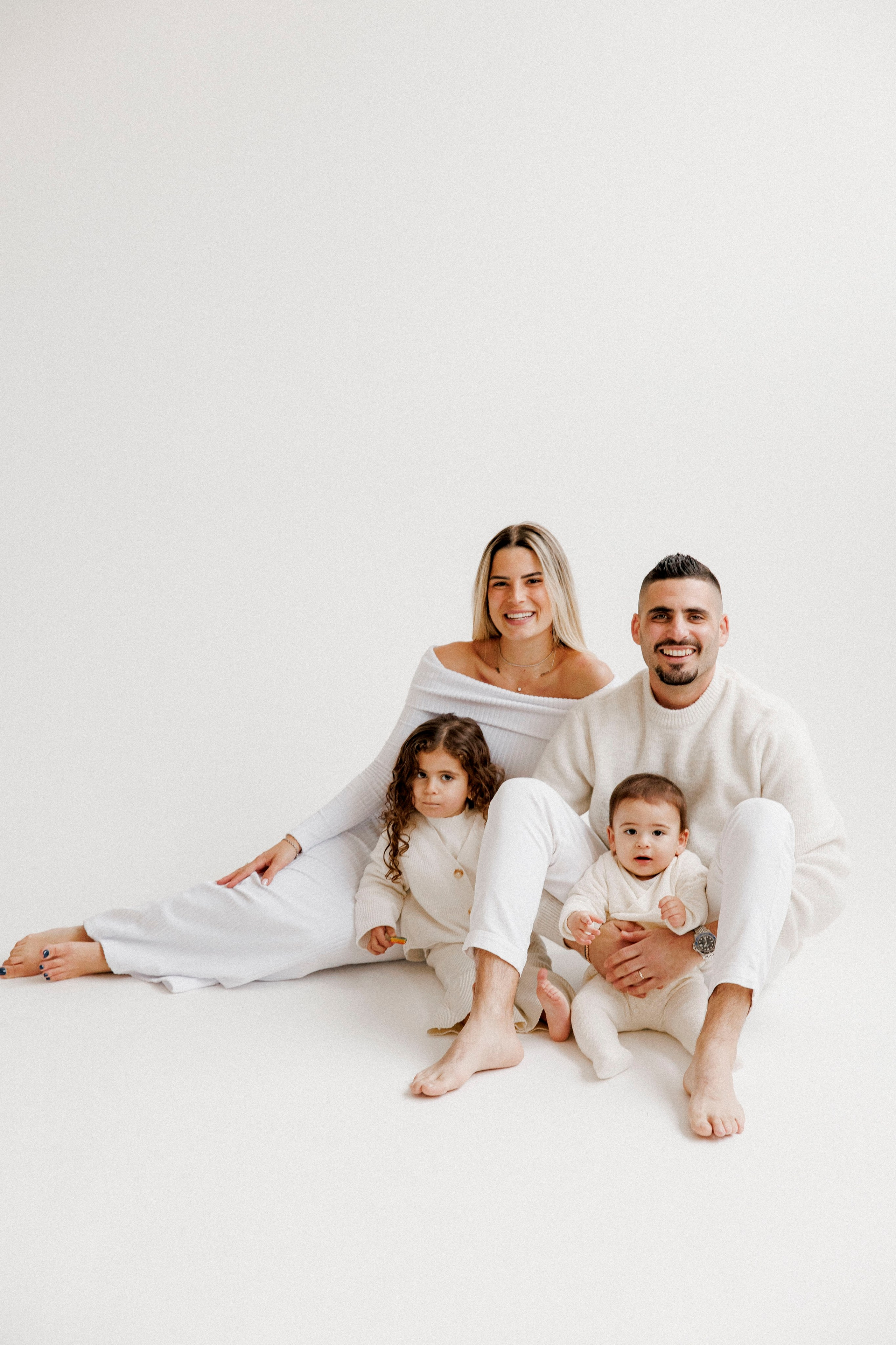 Family photoshoot in White Studio. Wedding and family photographer
