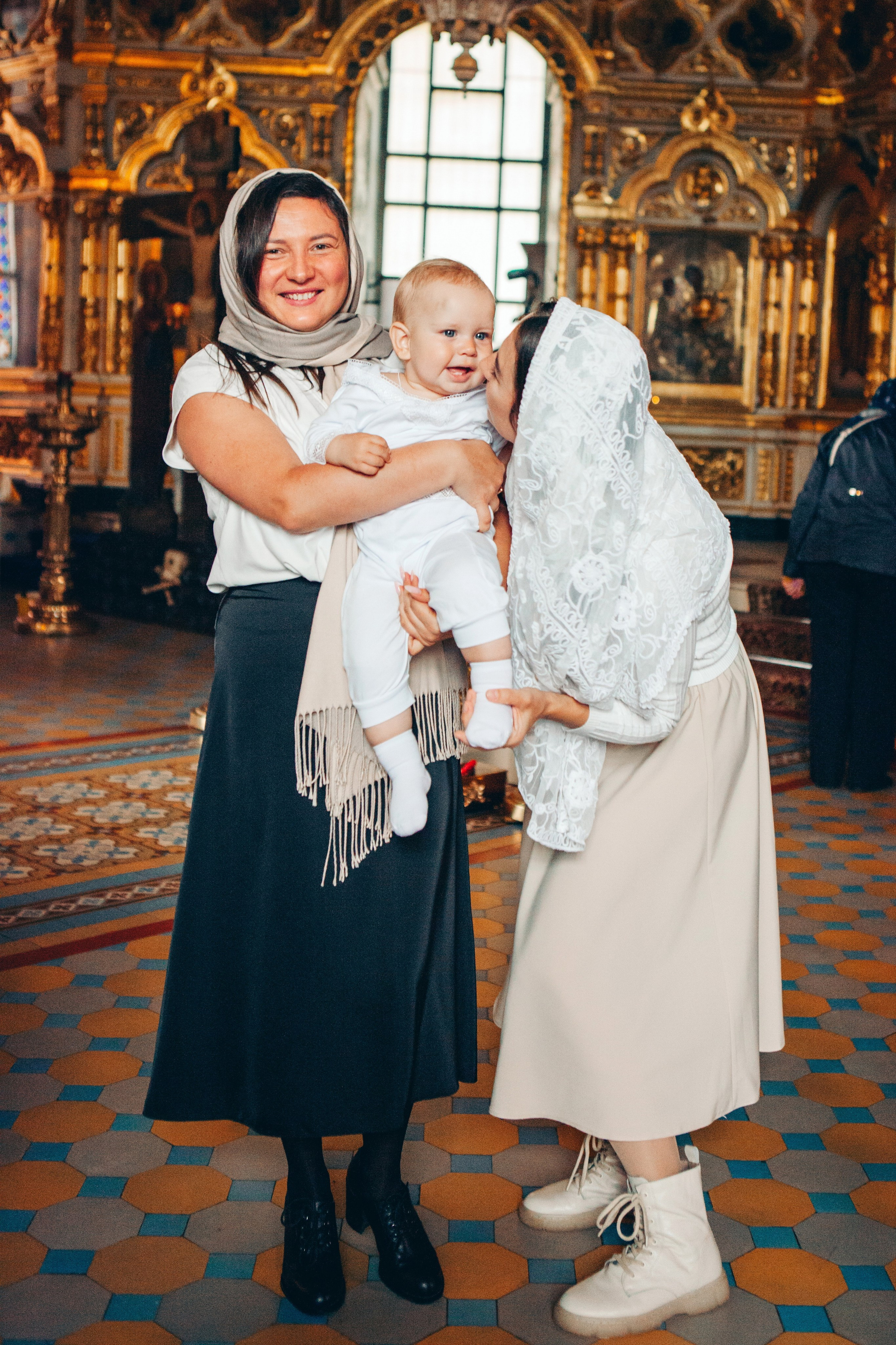 Крещение ребенка в церкви. Фотограф Ольга Ефремова