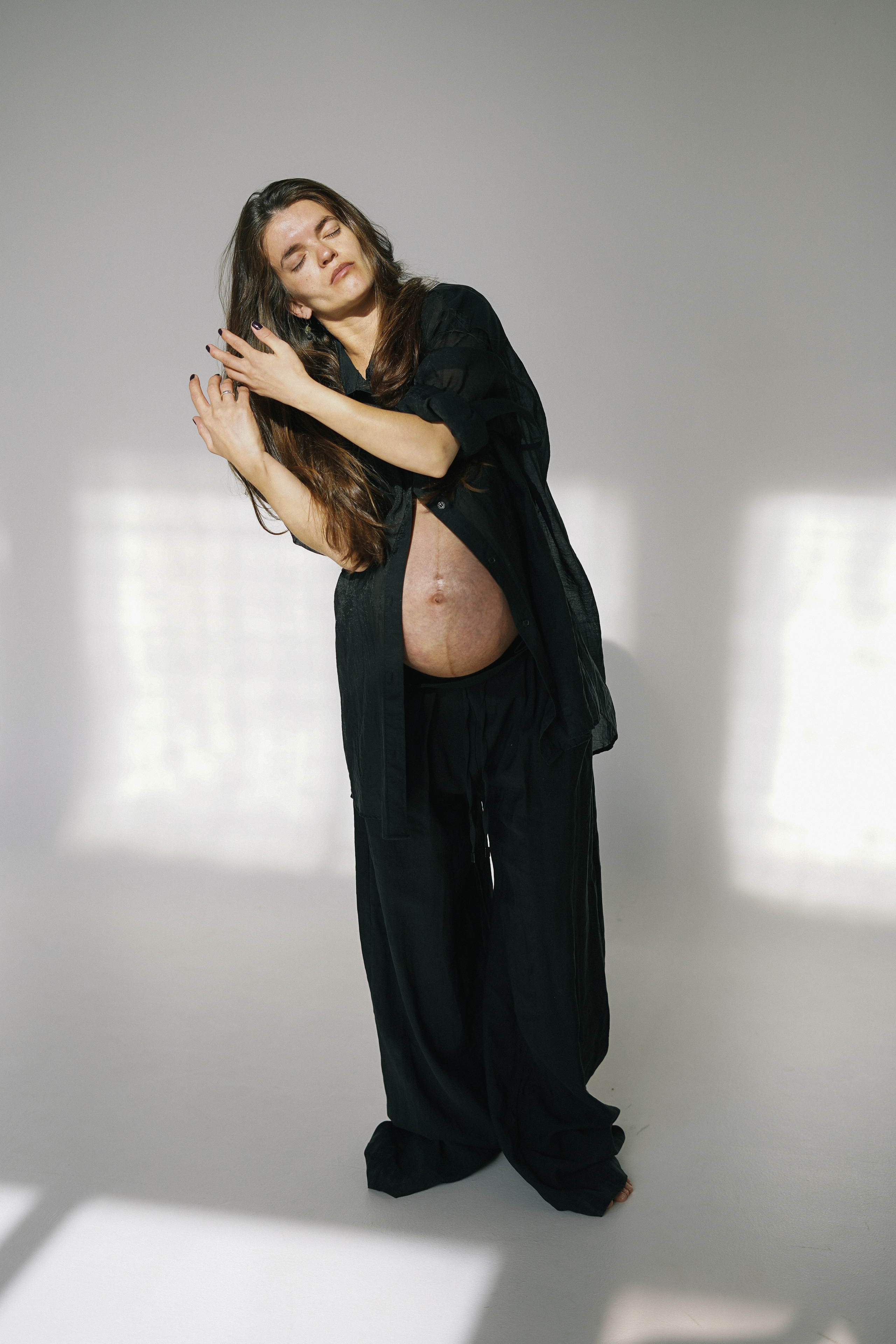 Lota in the sunny studio. Photographer and videographer Valeria Lisauske