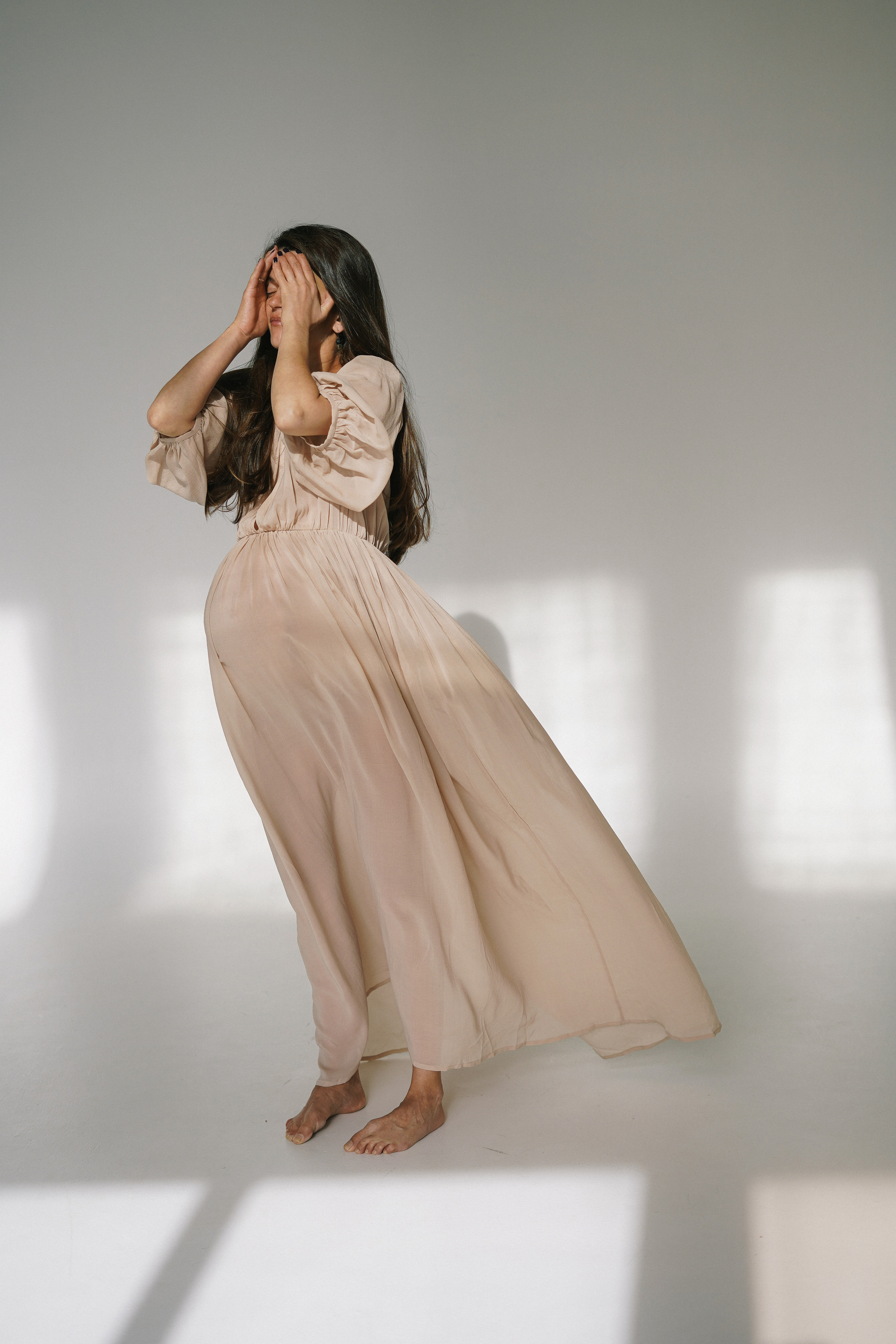 Lota in the sunny studio. Photographer and videographer Valeria Lisauske