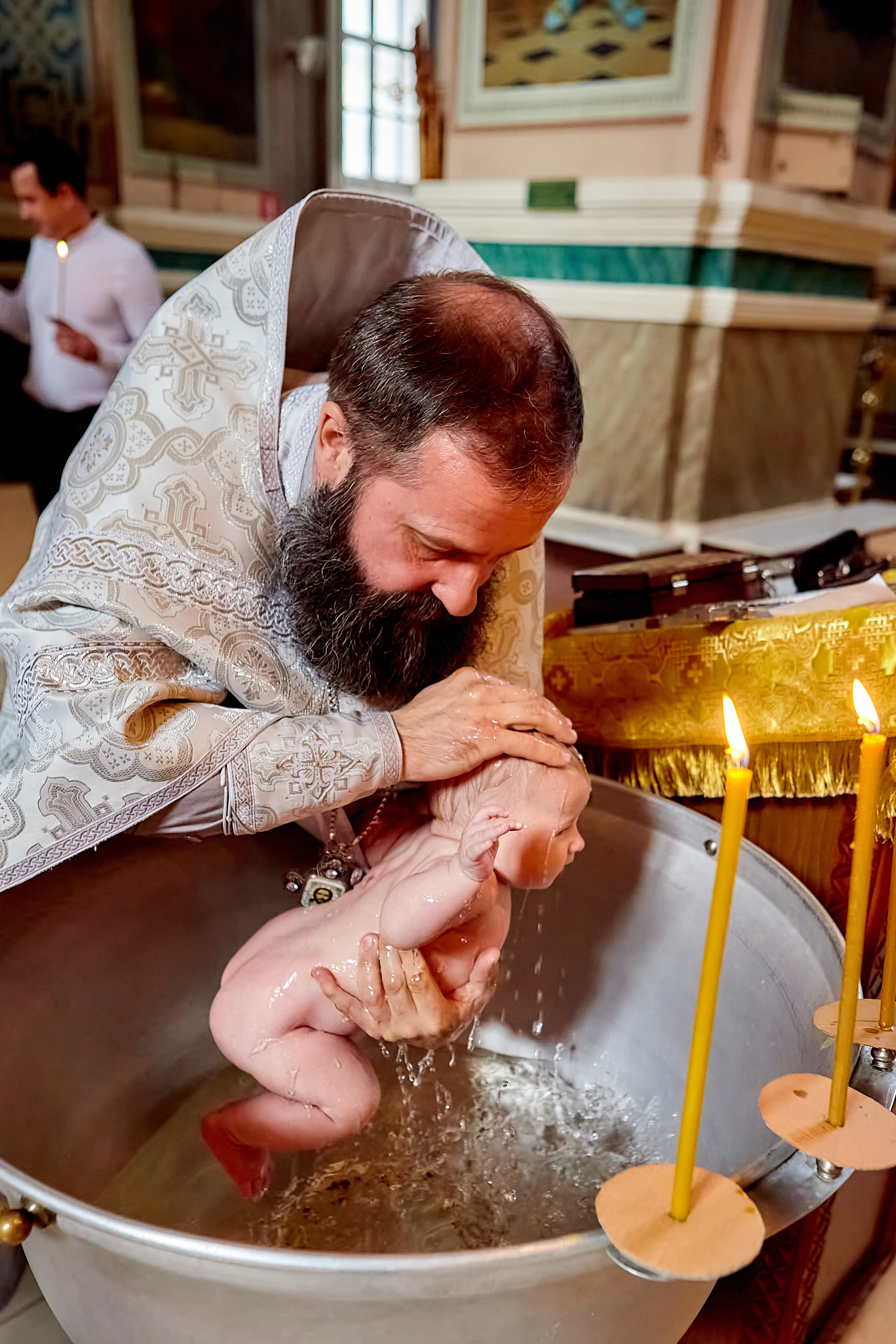 Таинство купания в купели на крещении
