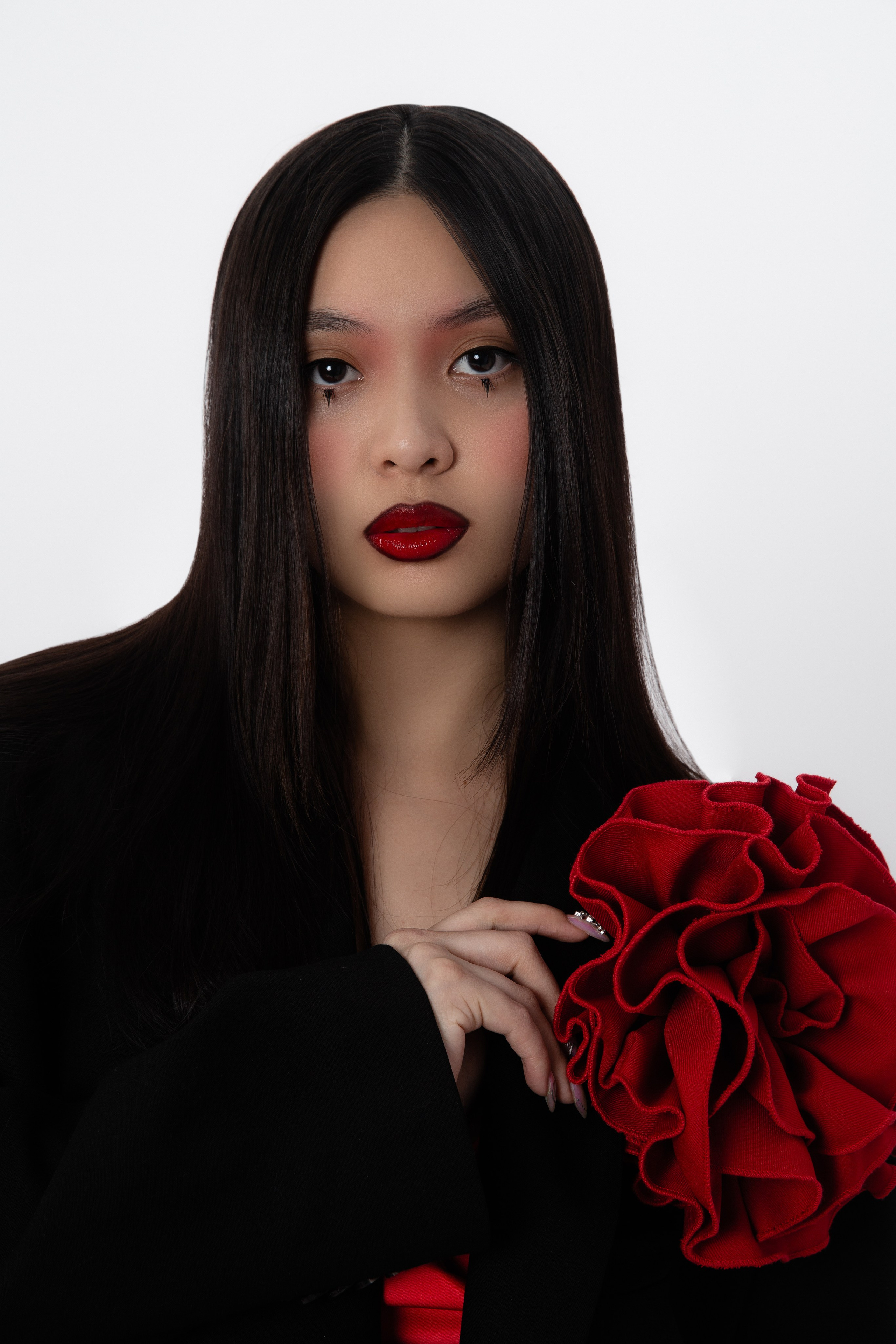 Bow. Photographer. Producer. Retoucher