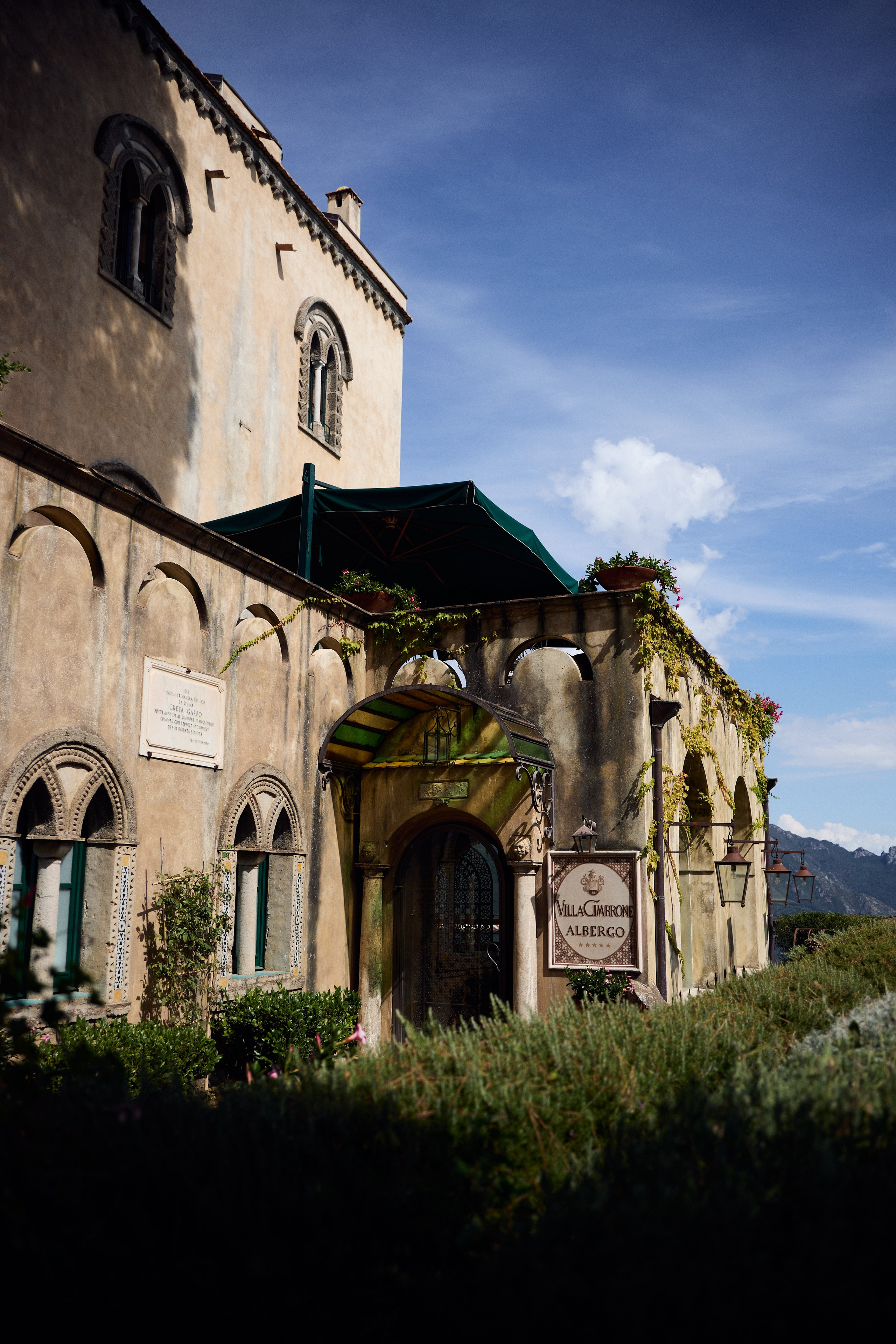 Entrance to Villa Cimbrone beneath a blue sky
