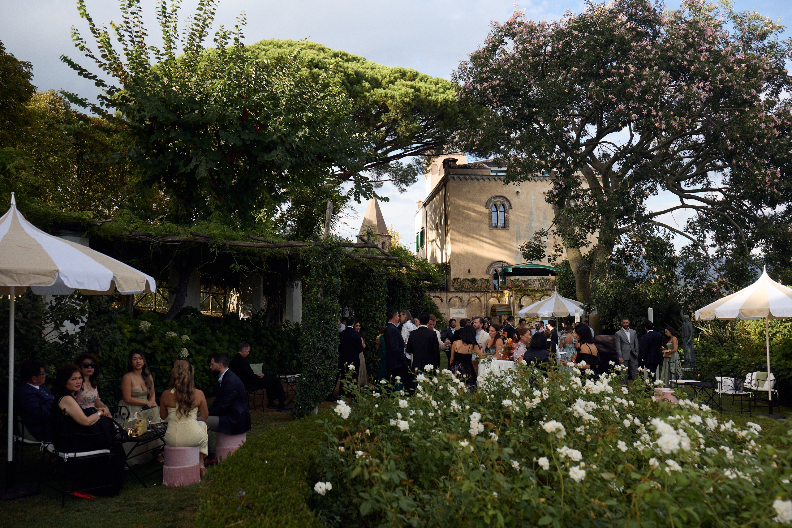 Wedding guests gathered in the gardens of Villa Cimbrone