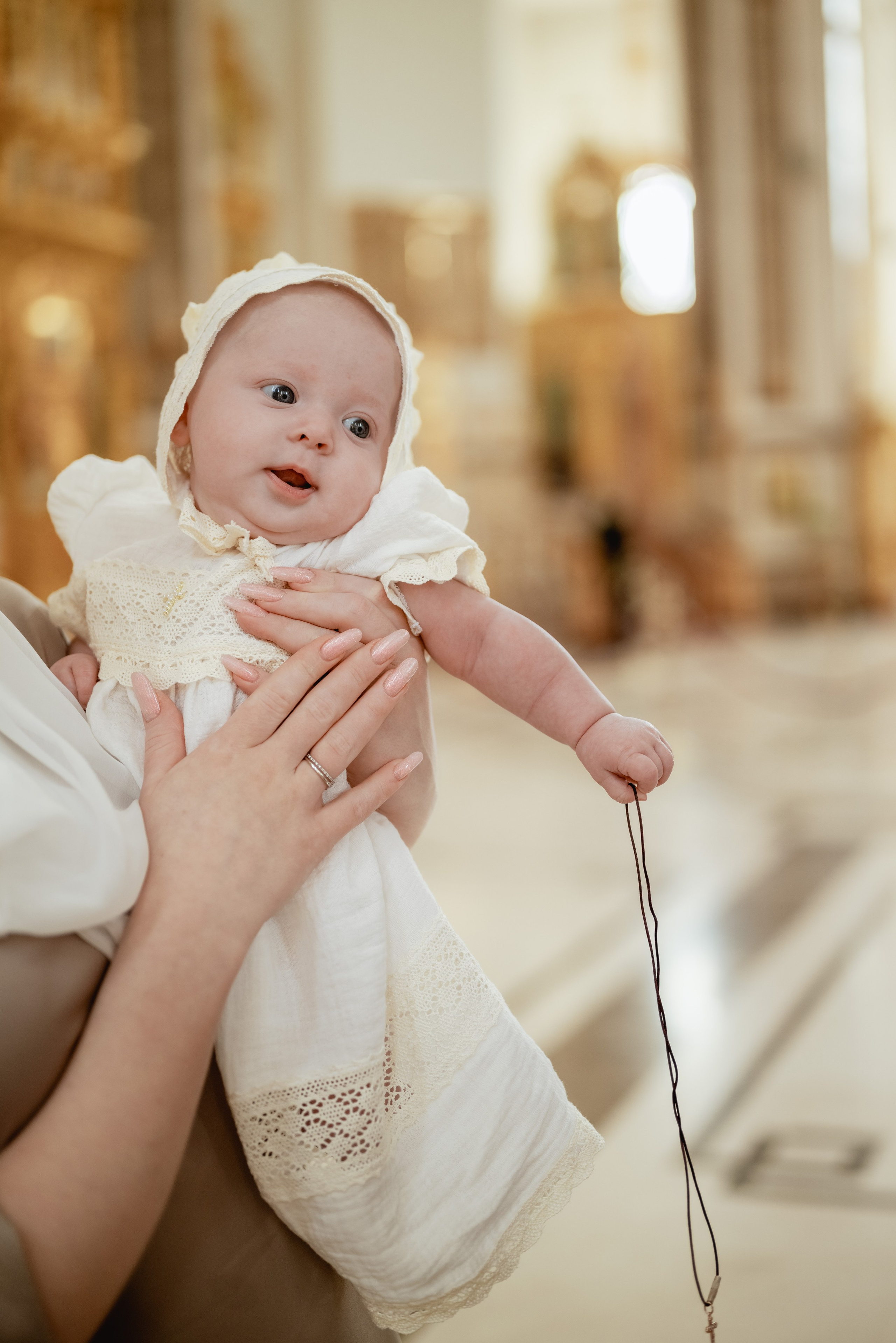 Крещение в храме Петра и Февронии. Юлия Басня семейный и свадебный фотограф в Донецке