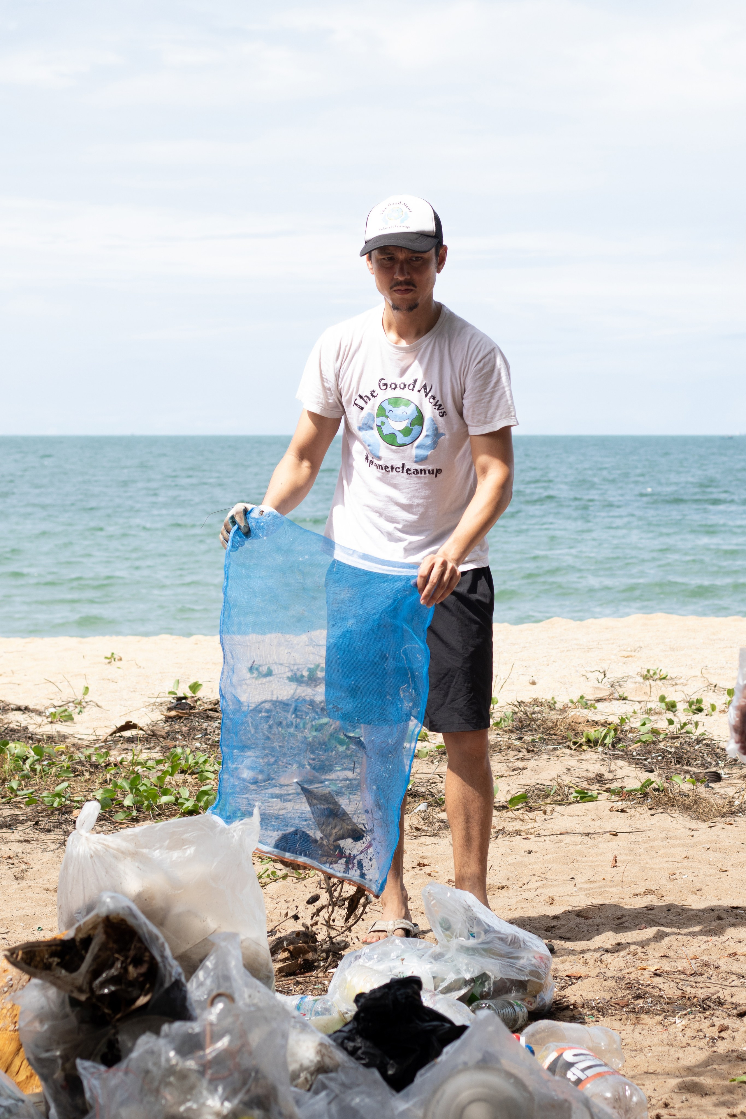 The Good News — PlanetCleanup. Portrait photographer in Thailand
