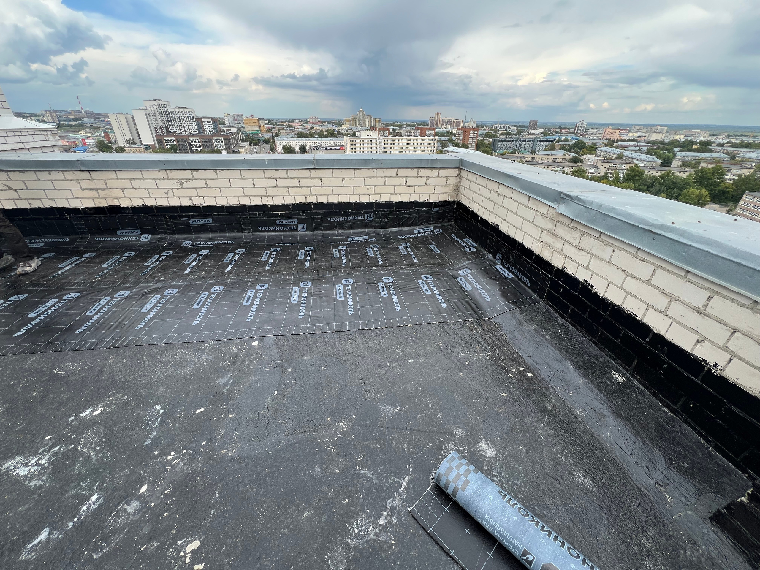 ТСЖ Строителей 33 Монтаж наплавляемой кровли