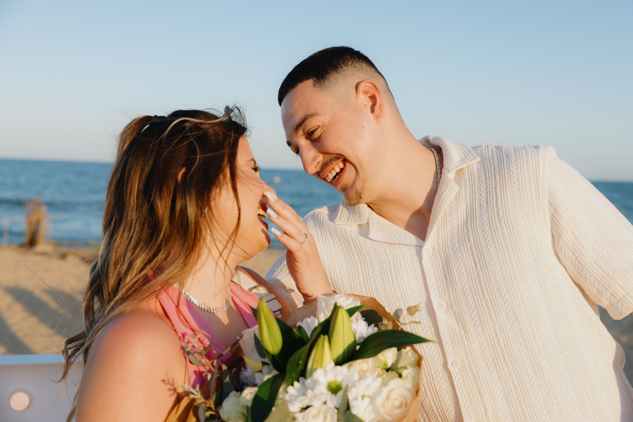 Couple embracing with joy right after the proposal