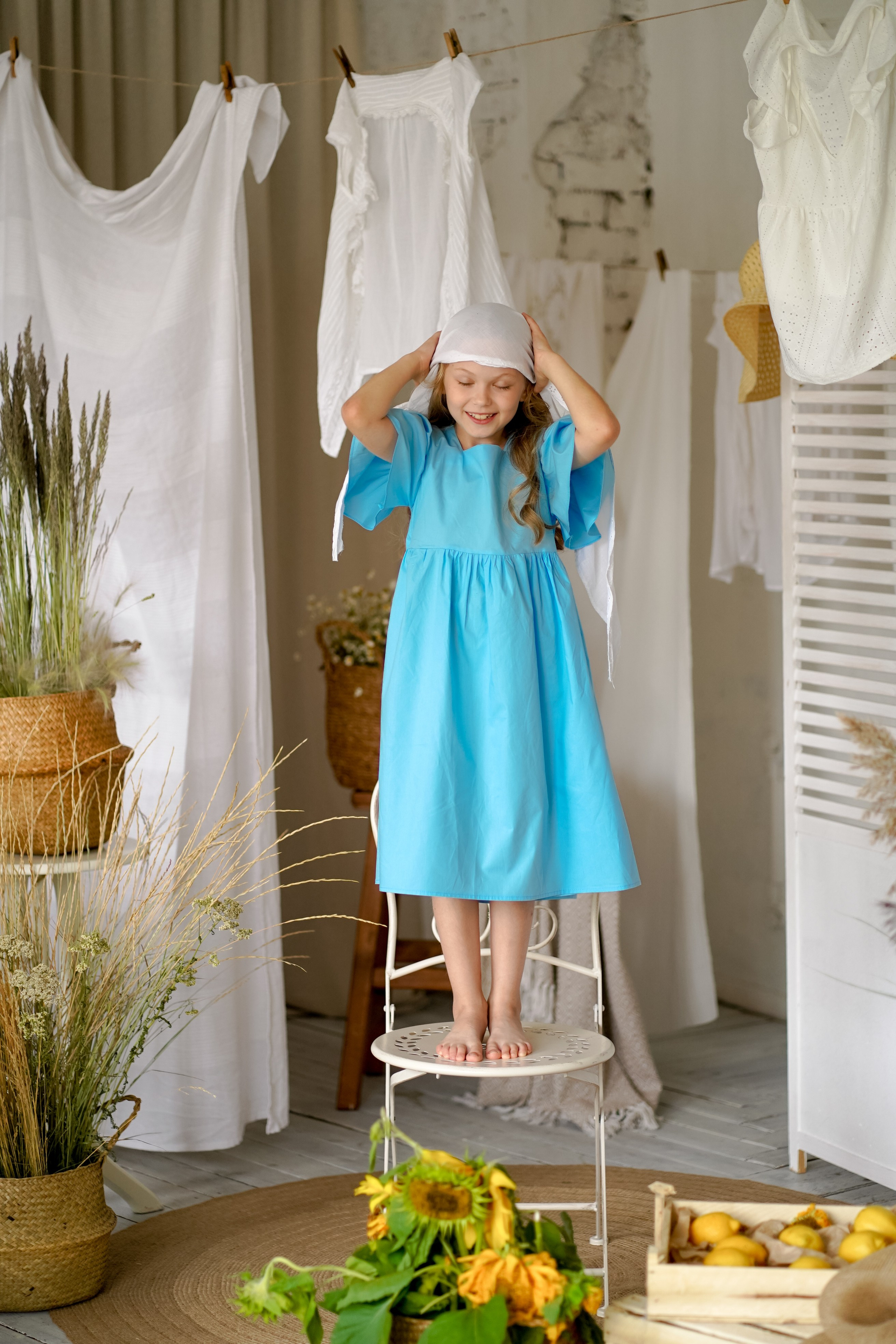 Кира с подсолнухами. Фотограф Татьяна Митрофанова