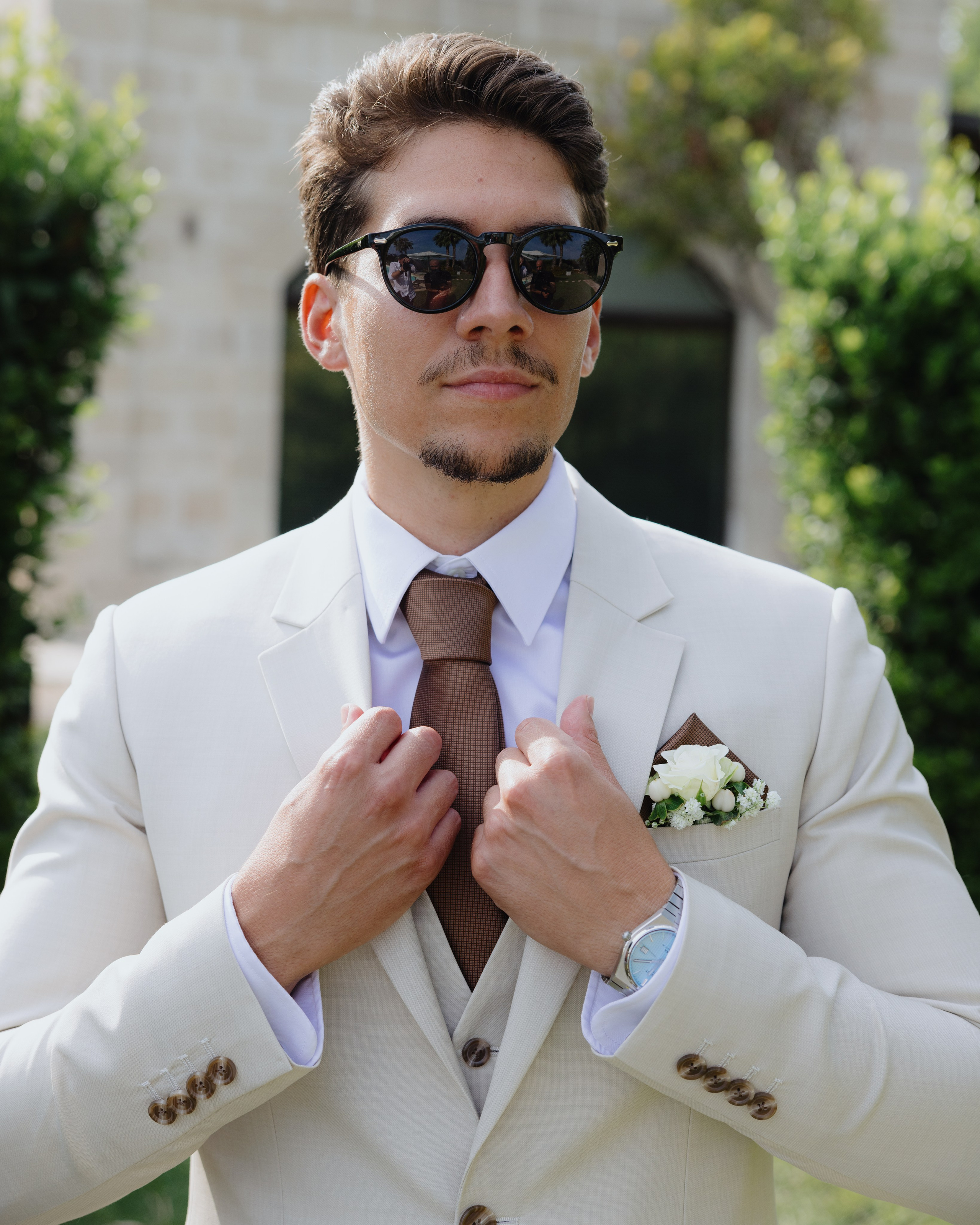 Elegant groom portrait before a luxury wedding at Lake Como, Italy