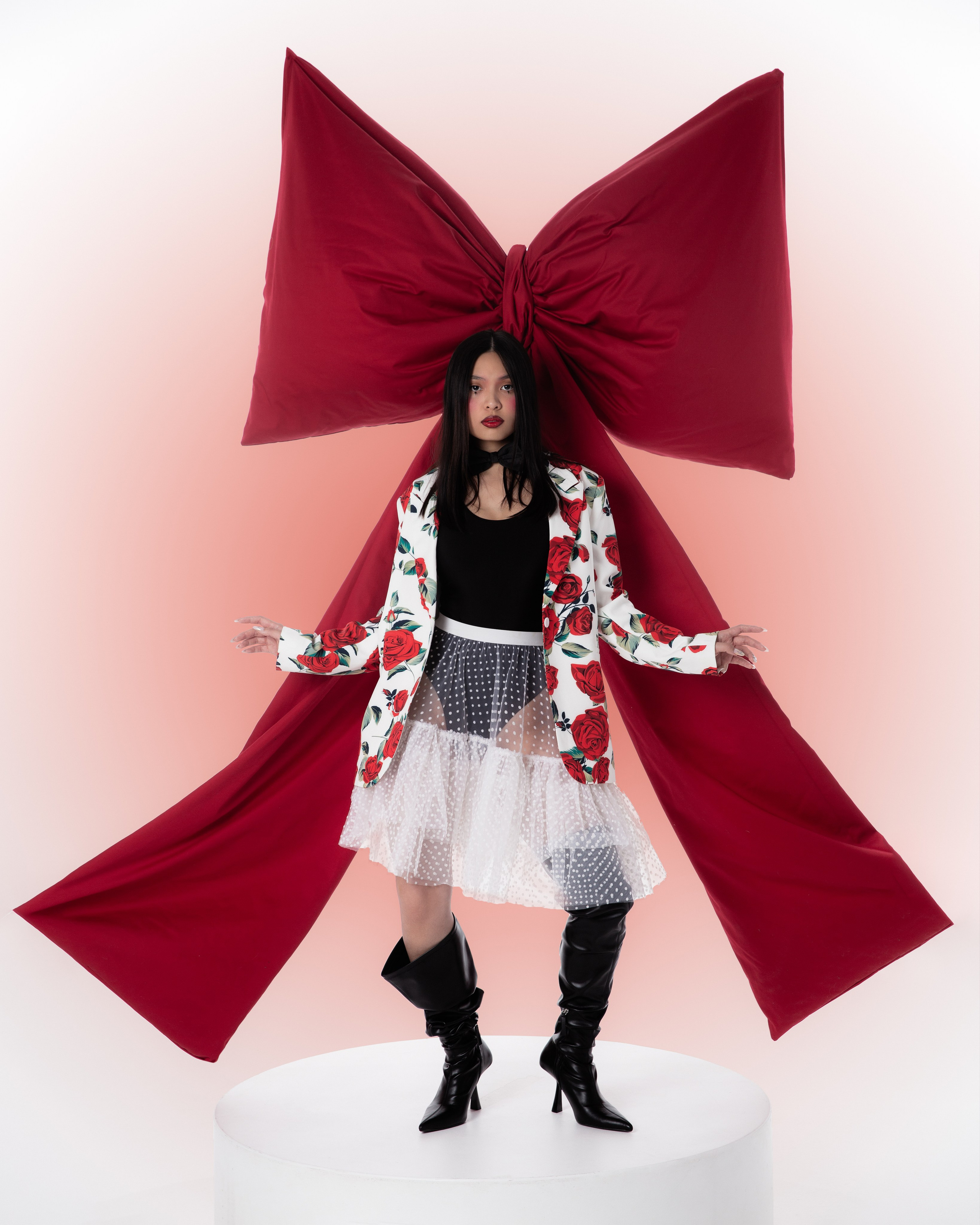 Bow. Photographer. Producer. Retoucher