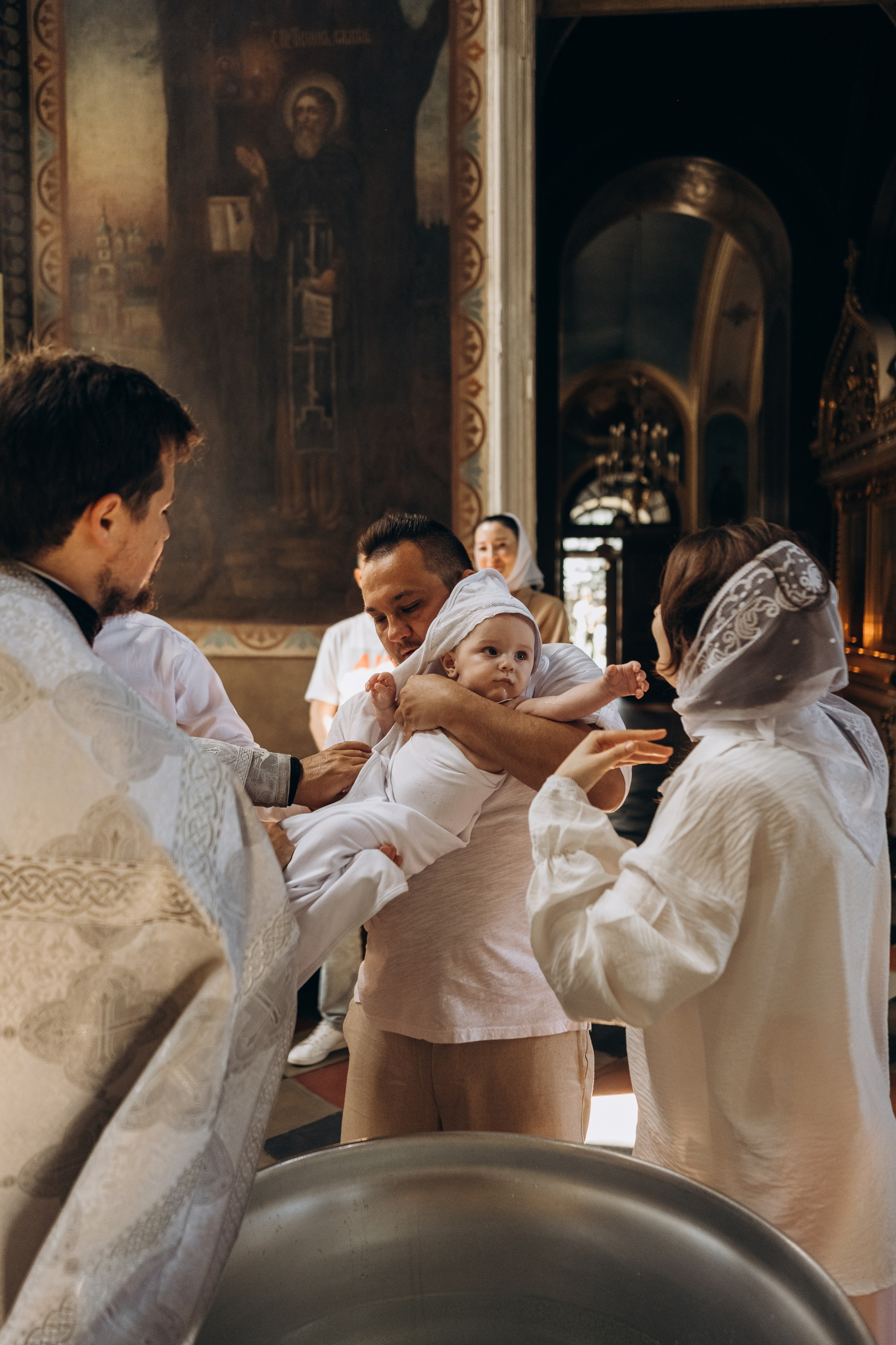 Крещение в Храме Нерукотворного образа Христа Спасителя. Фотограф Светлана Мерзлякова