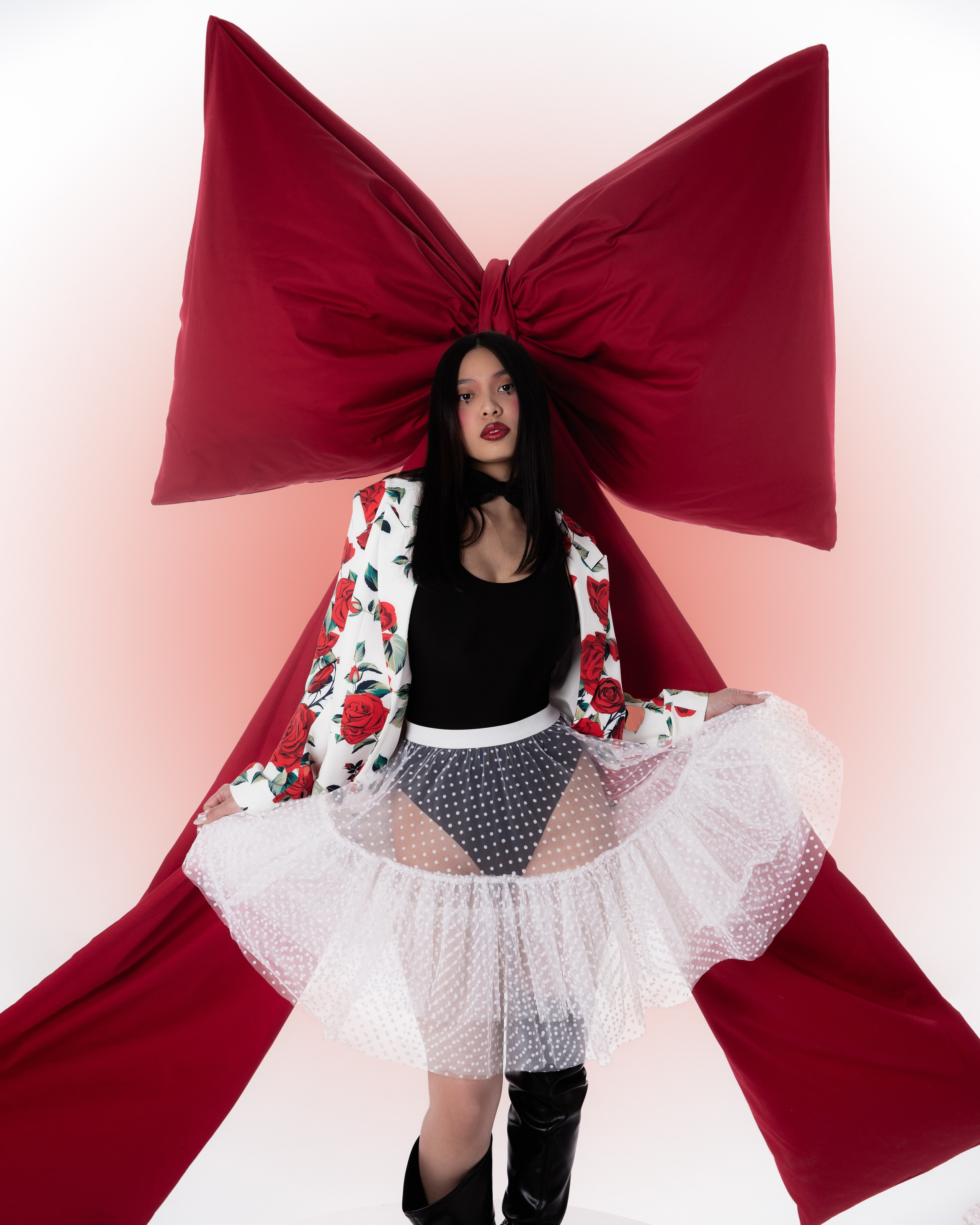 Bow. Photographer. Producer. Retoucher