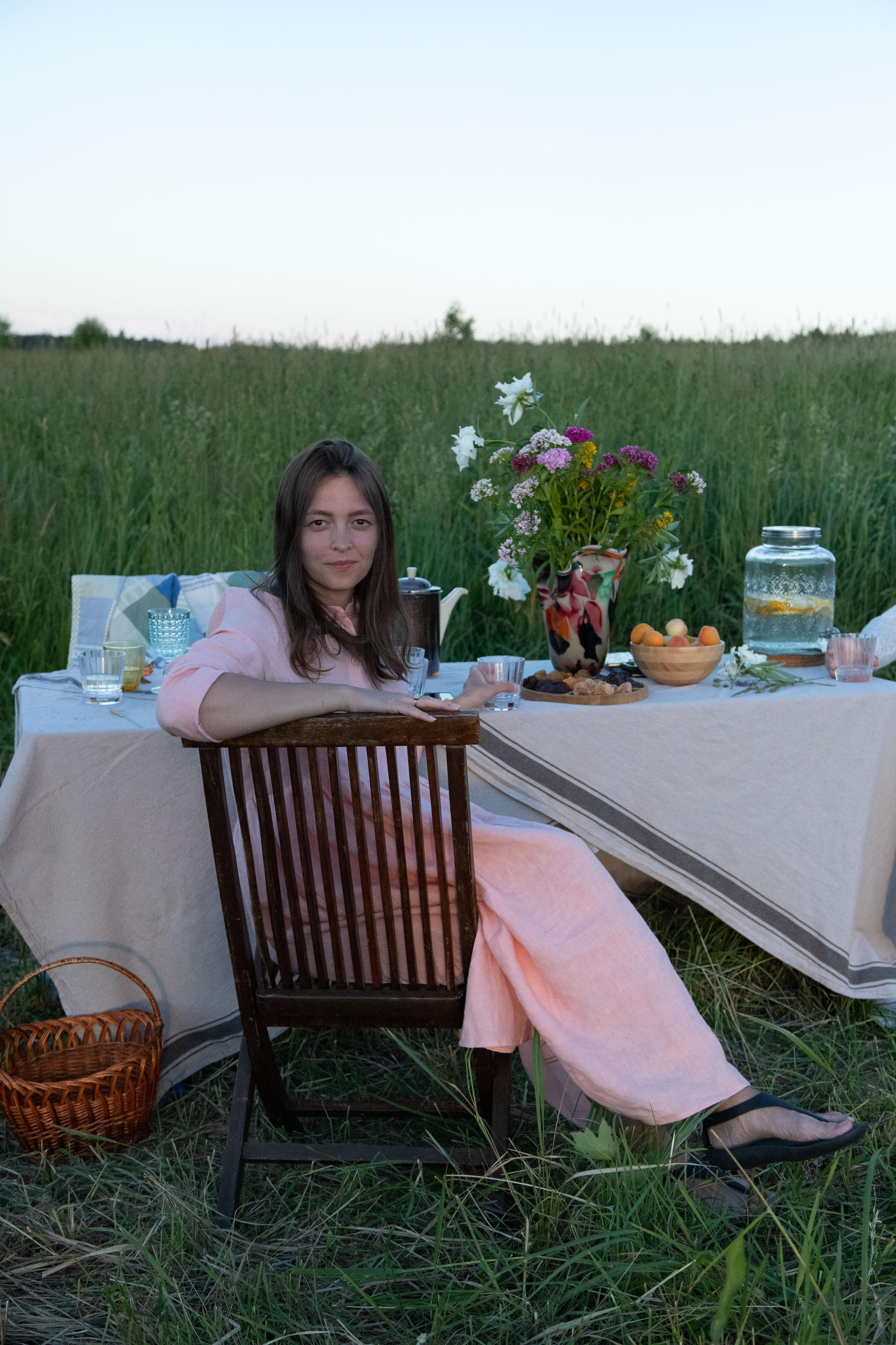 Family dining in the field. Home