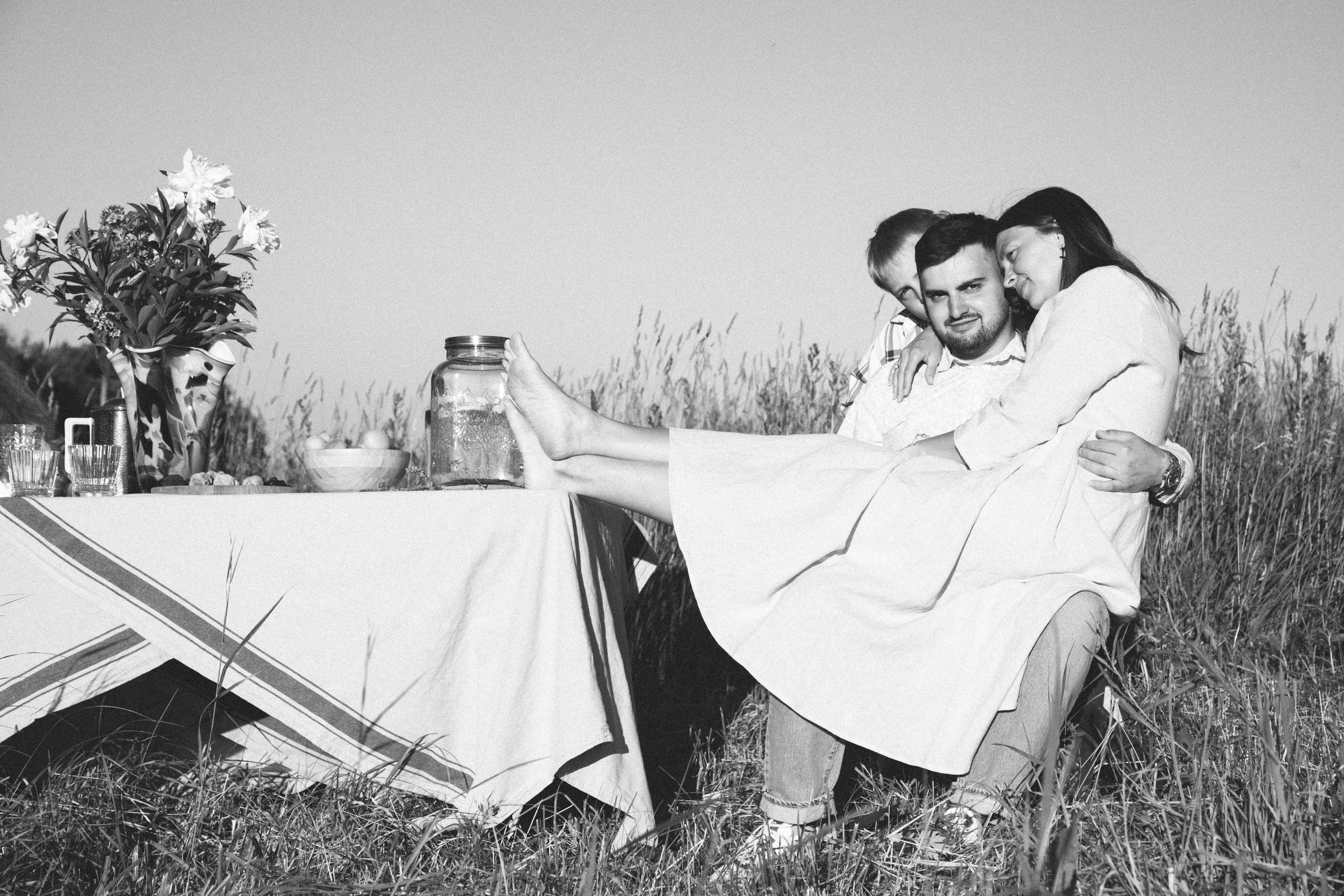 Family dining in the field. Home