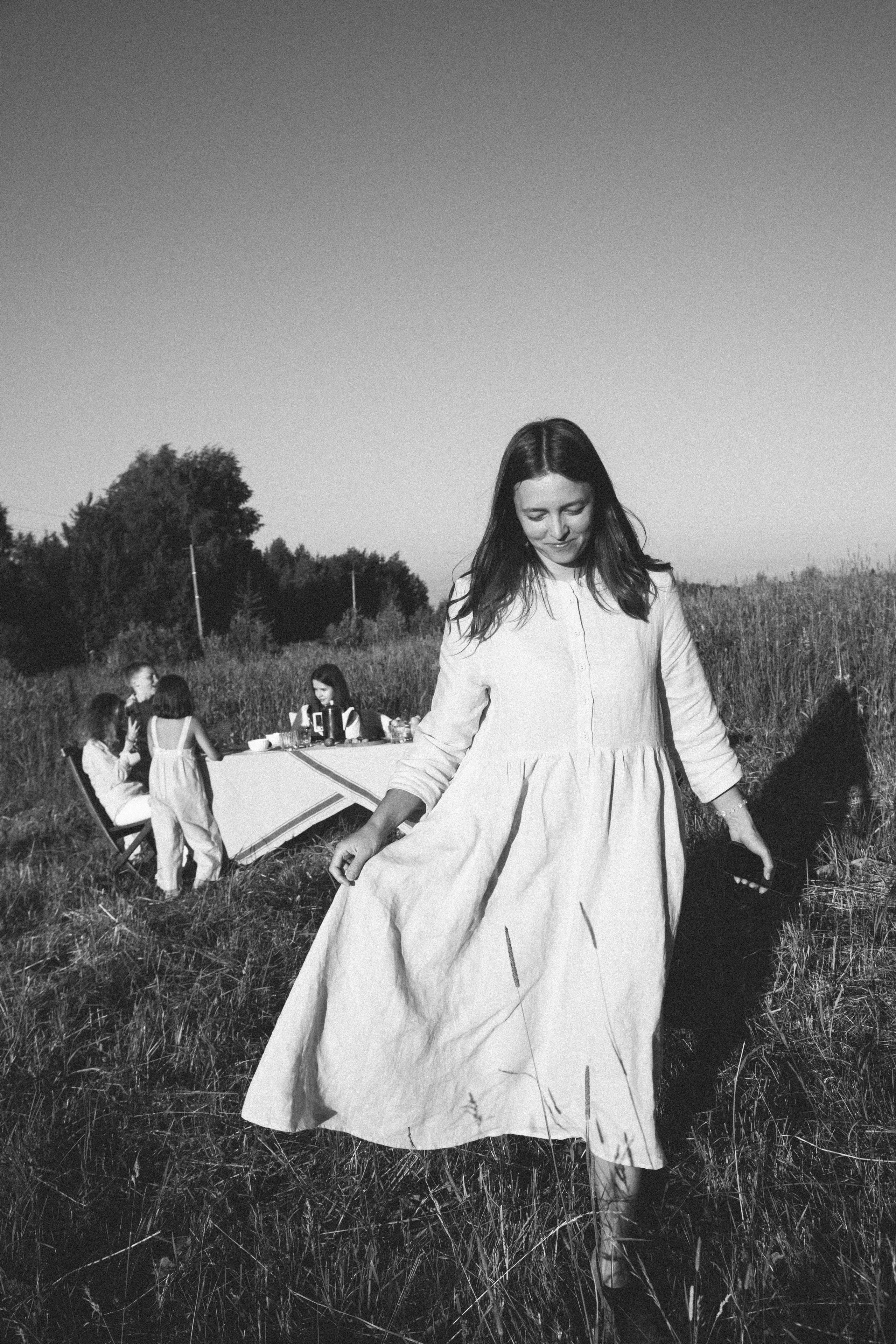 Family dining in the field. Home