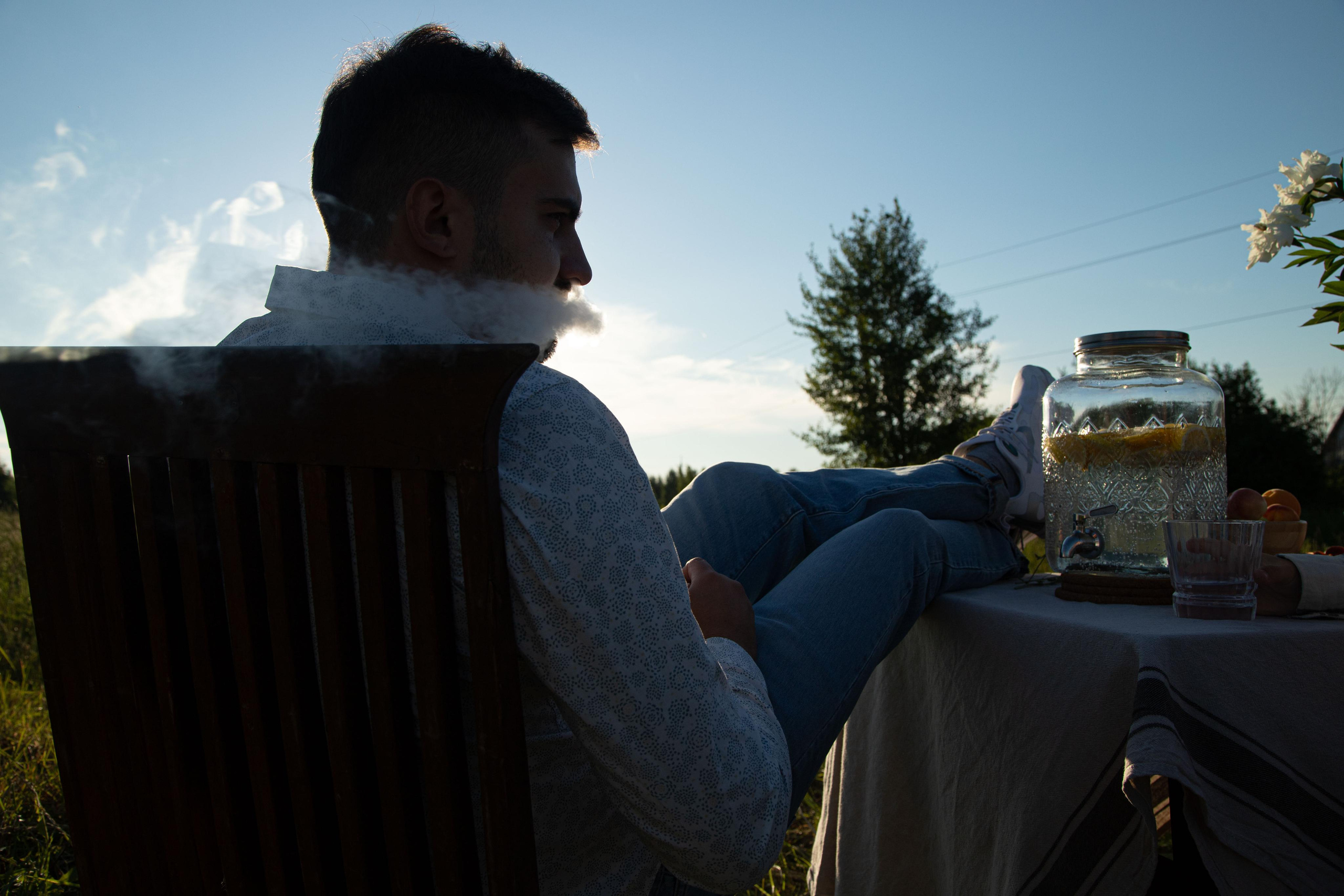 Family dining in the field. Home