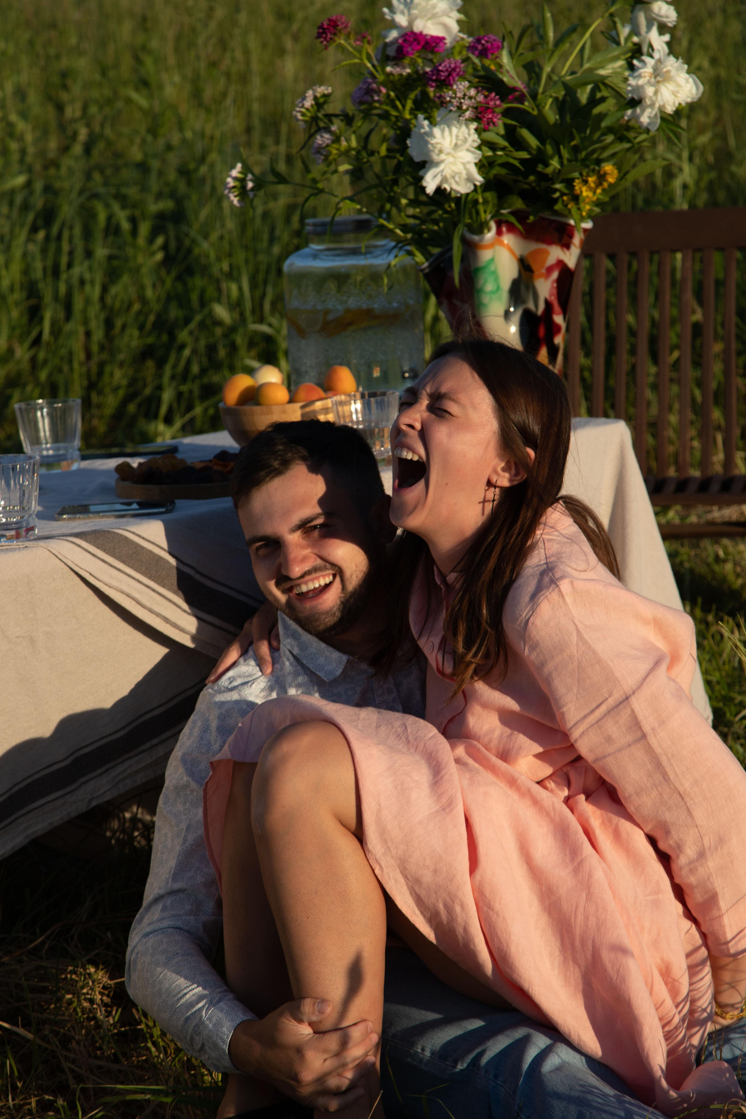 Family dining in the field. Home
