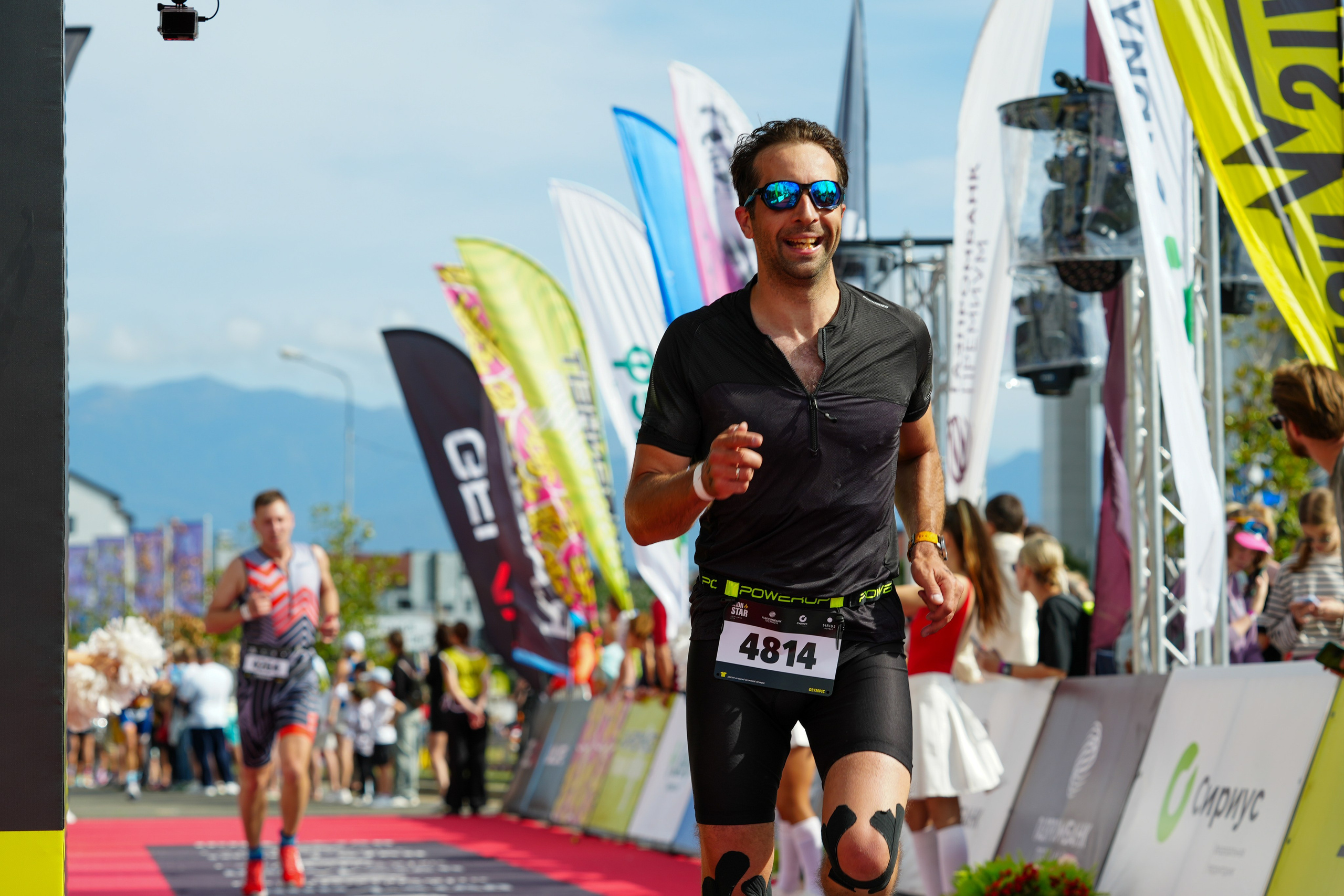 Фотоотчет партнерской интеграции для компании TELE2 на фестивале Ironstar. Репортажный фотограф в Красной Поляне и Сочи Павлюченко Екатерина