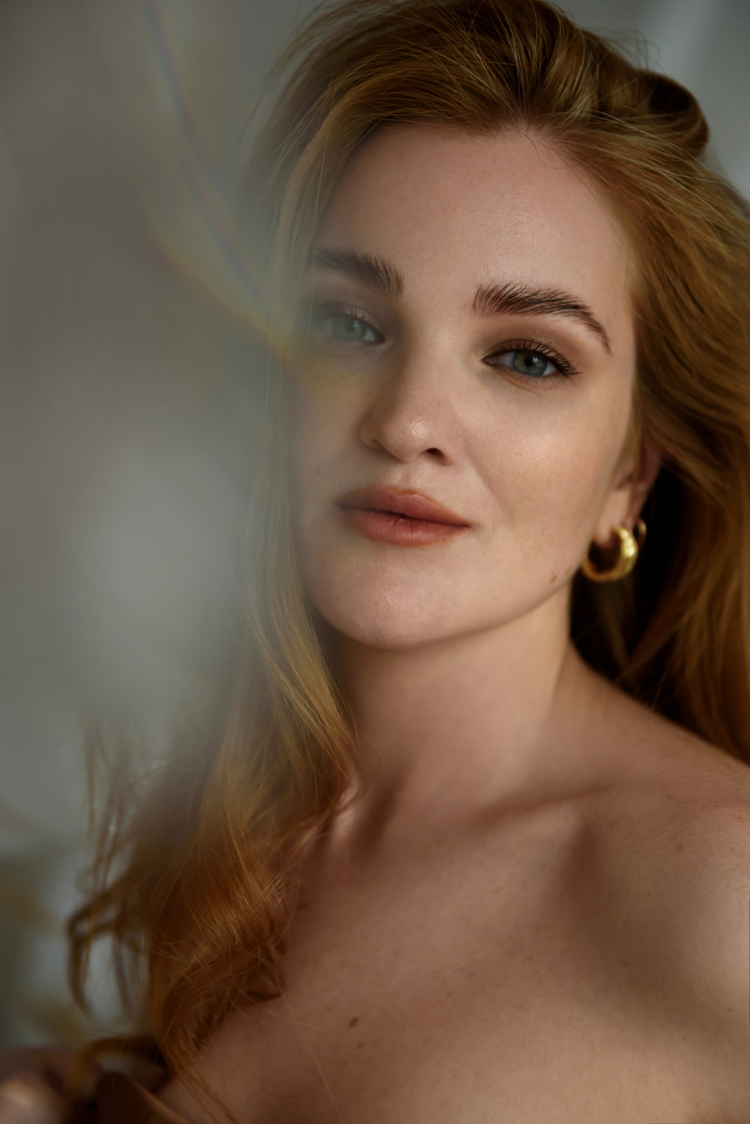 красивая рыжая девушка фото крупный план с бликами