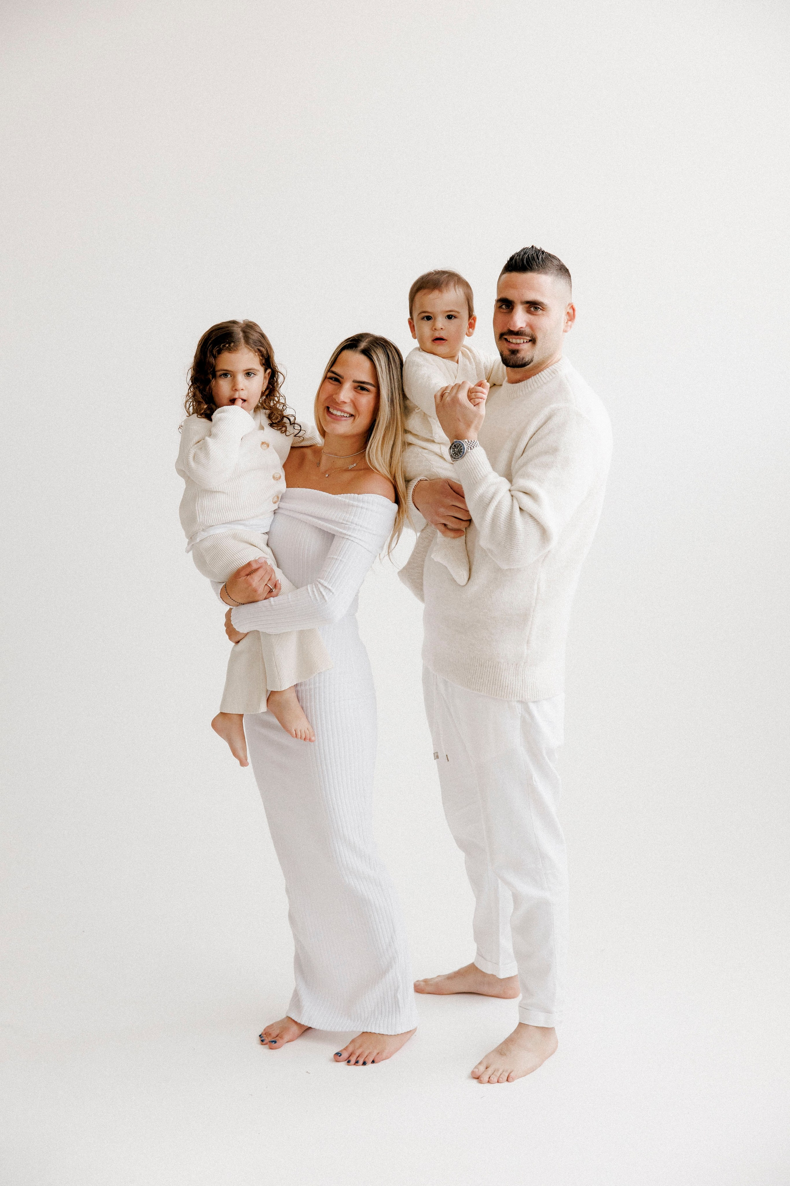 Family photoshoot in White Studio. Wedding and family photographer