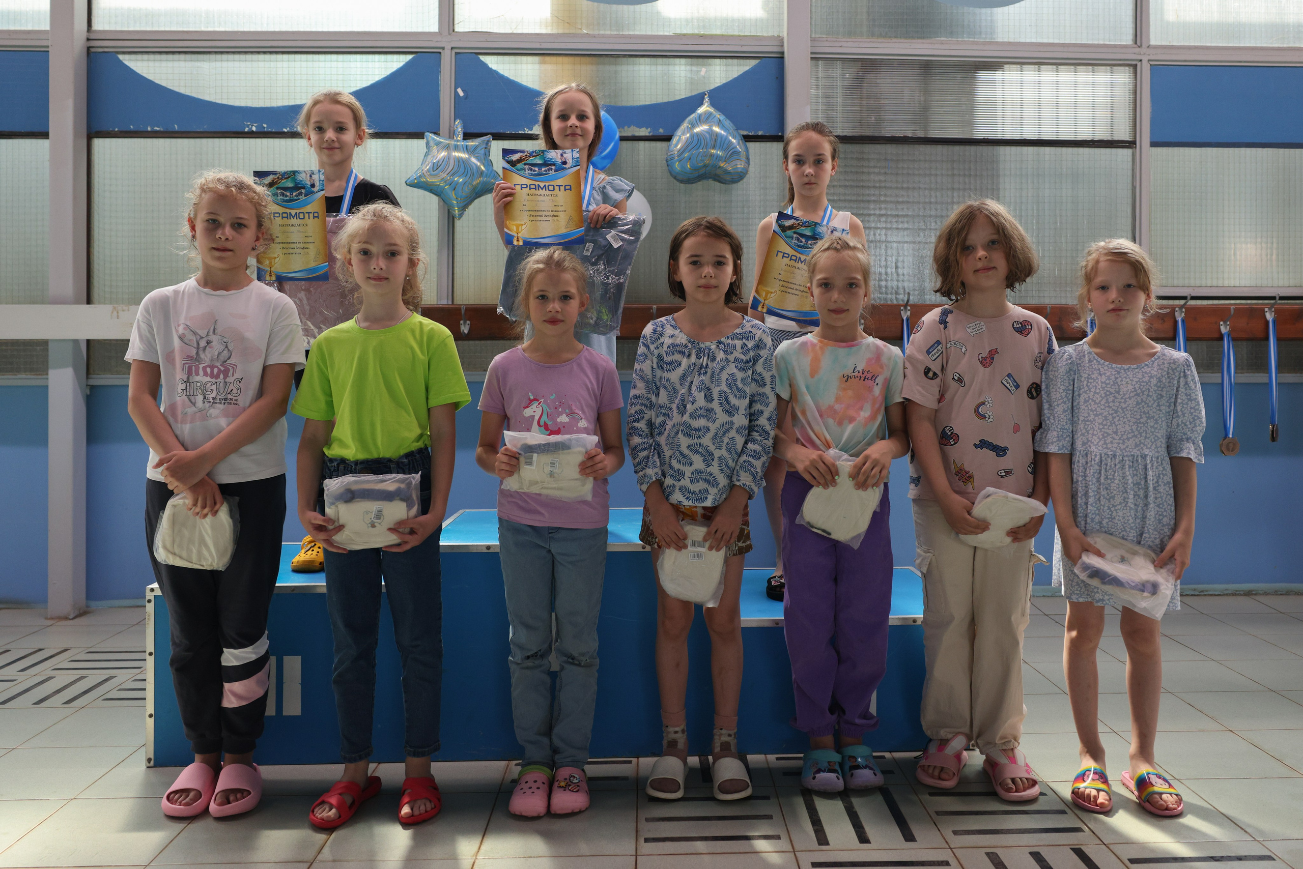 Веселый дельфин. Плавание. Дети 8-9 лет. Фотограф Александр Заломаев