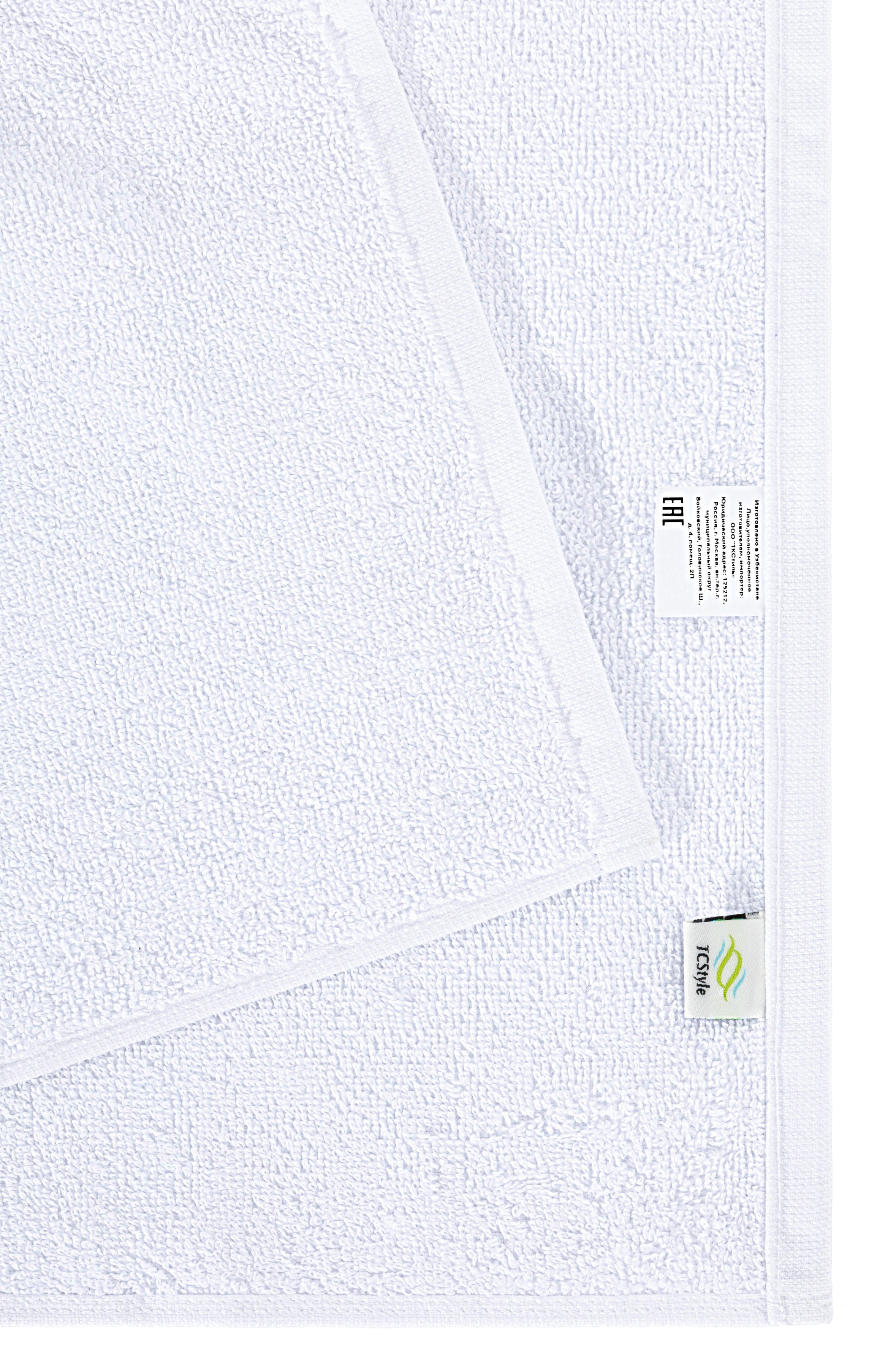 Крупный план текстуры белого полотенца на белом фоне | Макросъемка для каталога