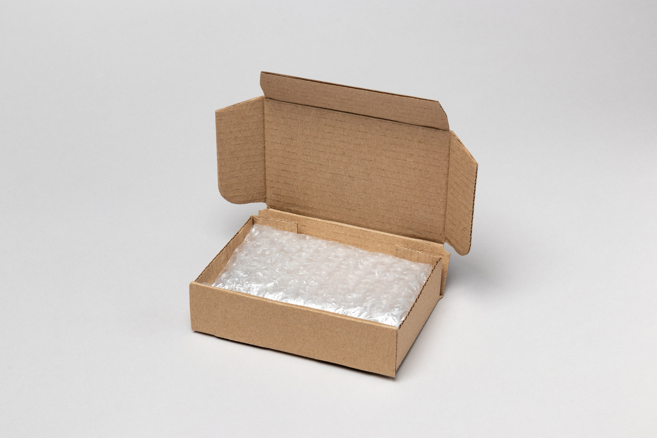 Съёмка упаковки на сером фоне. Предметный фотограф в Нижнем Новгороде Денис Павлов