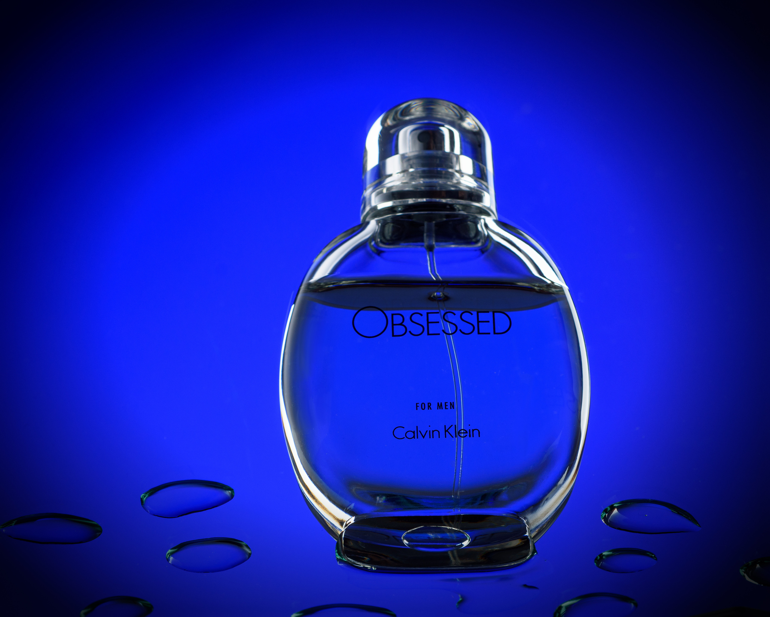 Obsessed флакон духов на стекле с каплями