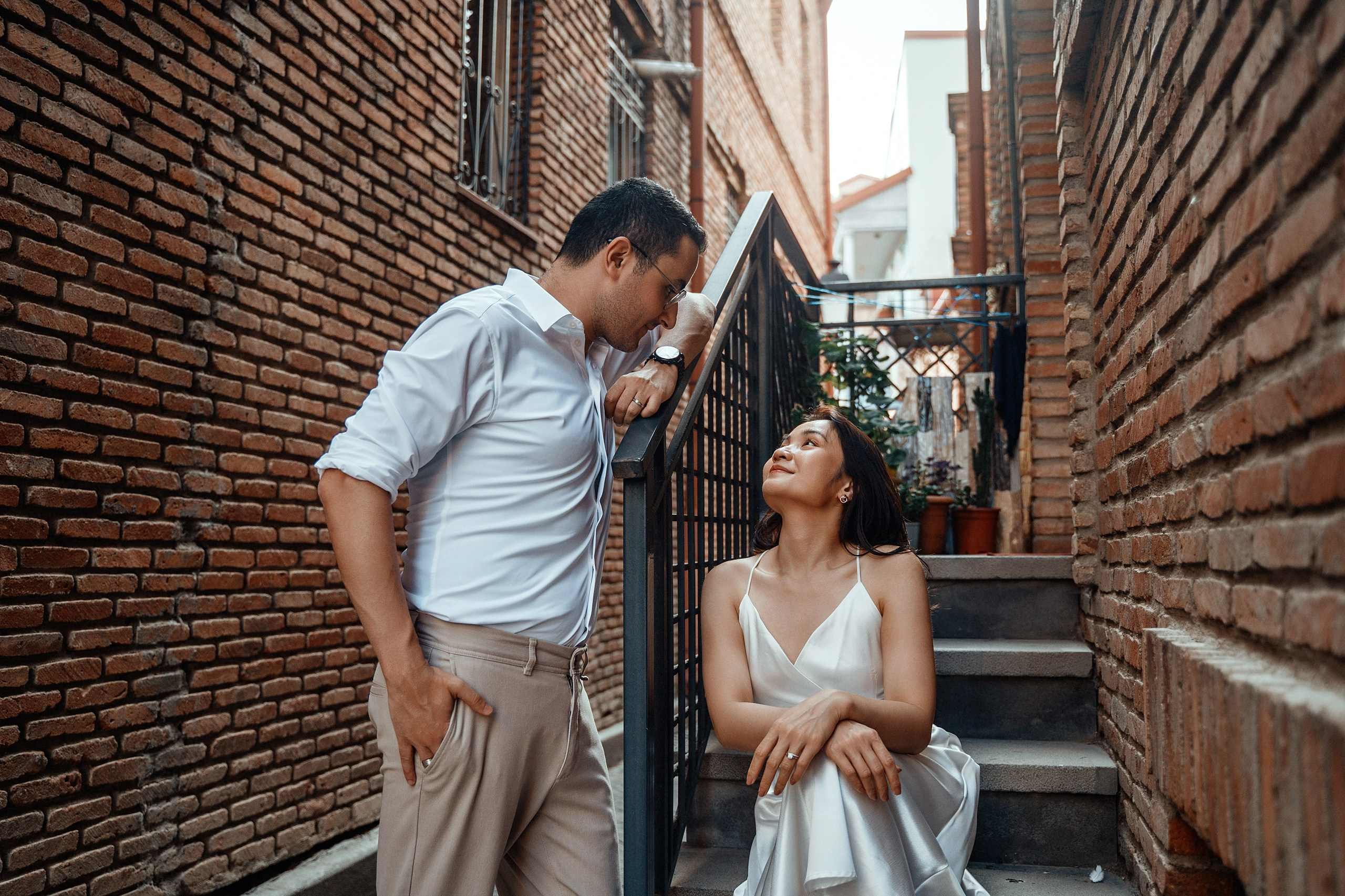 Alaeddine & Matika on the Peace Bridge in Tbilisi. Photographer Sergey Otkrytyi in Batumi & Tbilisi